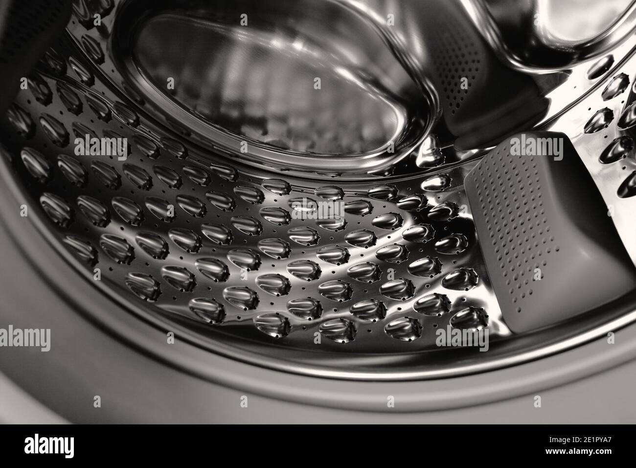 Inside of the washing machine drum. Stock Photo