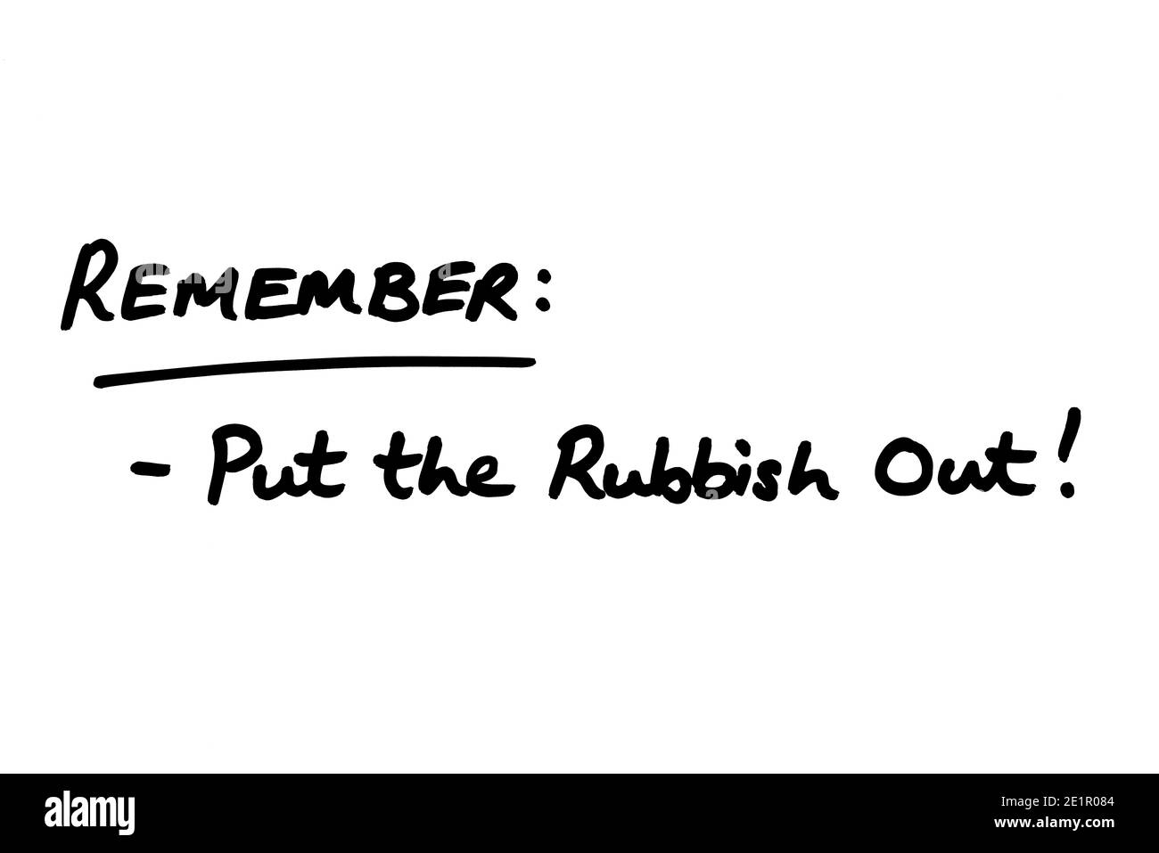 Remember - Out the Rubbish Out! handwritten on a white background. Stock Photo