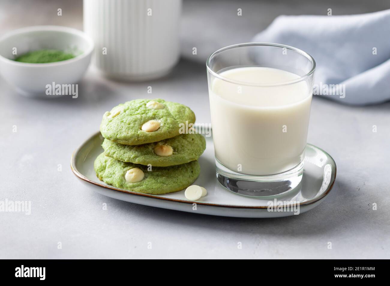 green tea matcha cookies and glass with plant based milk Stock Photo