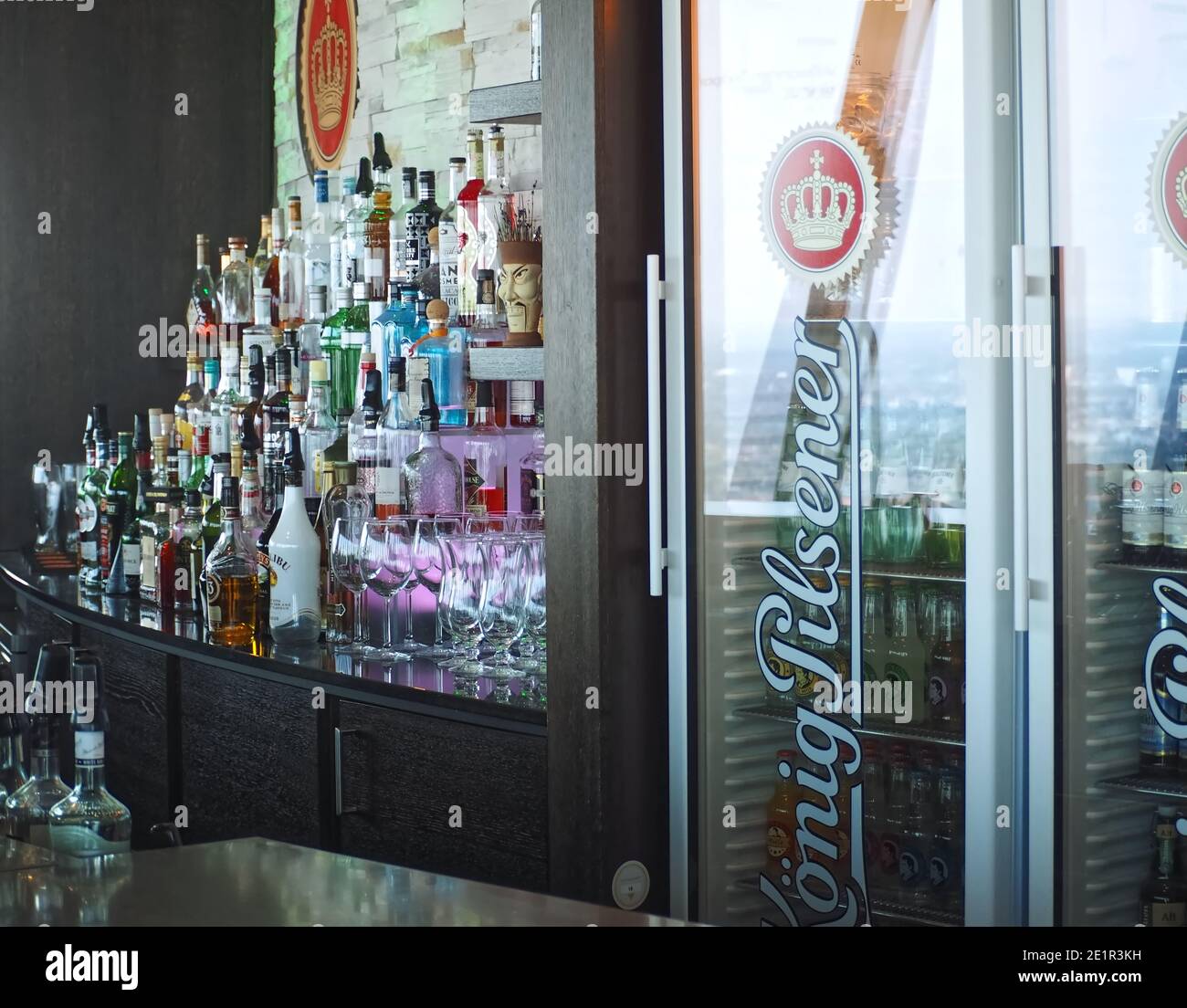 Many bottles of alcohol in a bar to create drinks Stock Photo