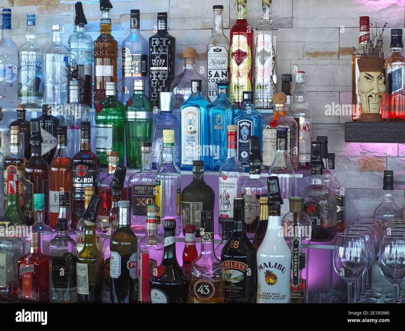 Many bottles of alcohol in a bar to create drinks Stock Photo Alamy