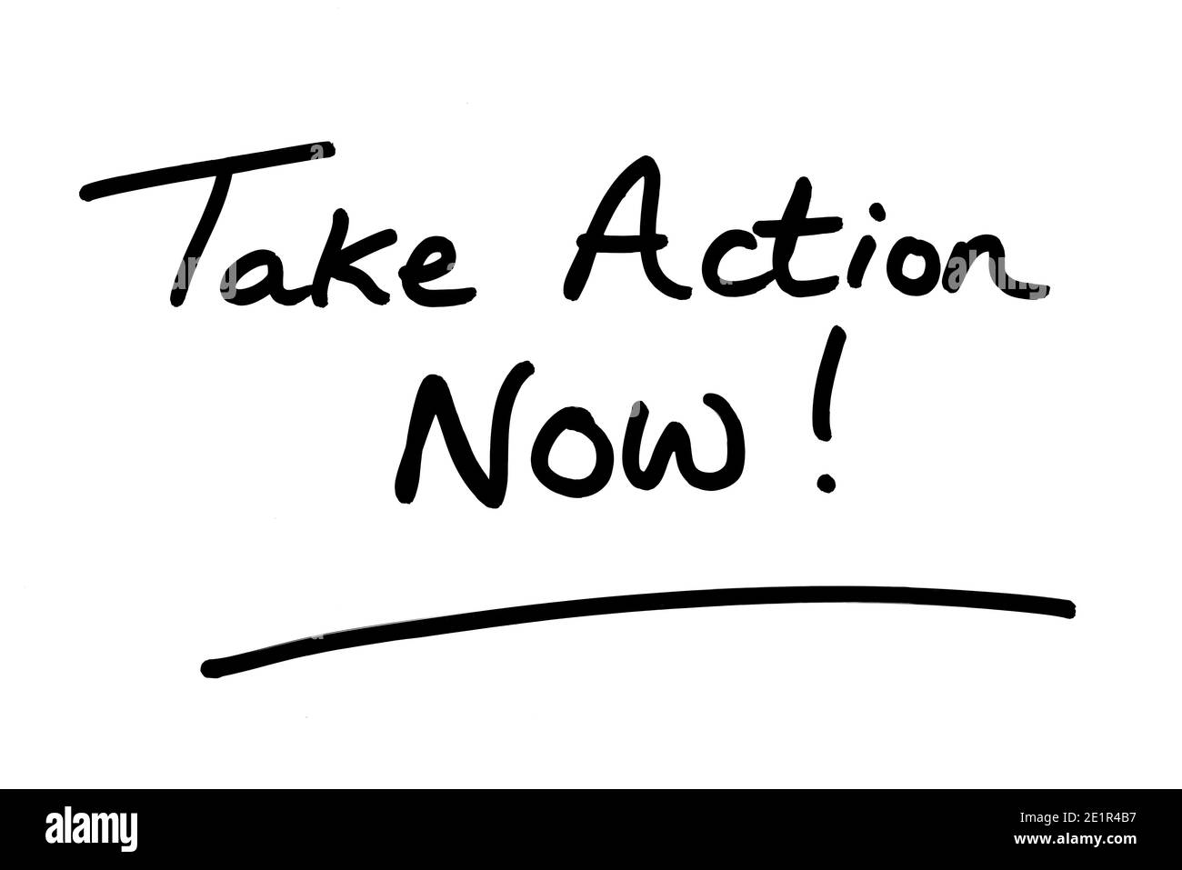 Take Action Now! handwritten on a white background. Stock Photo