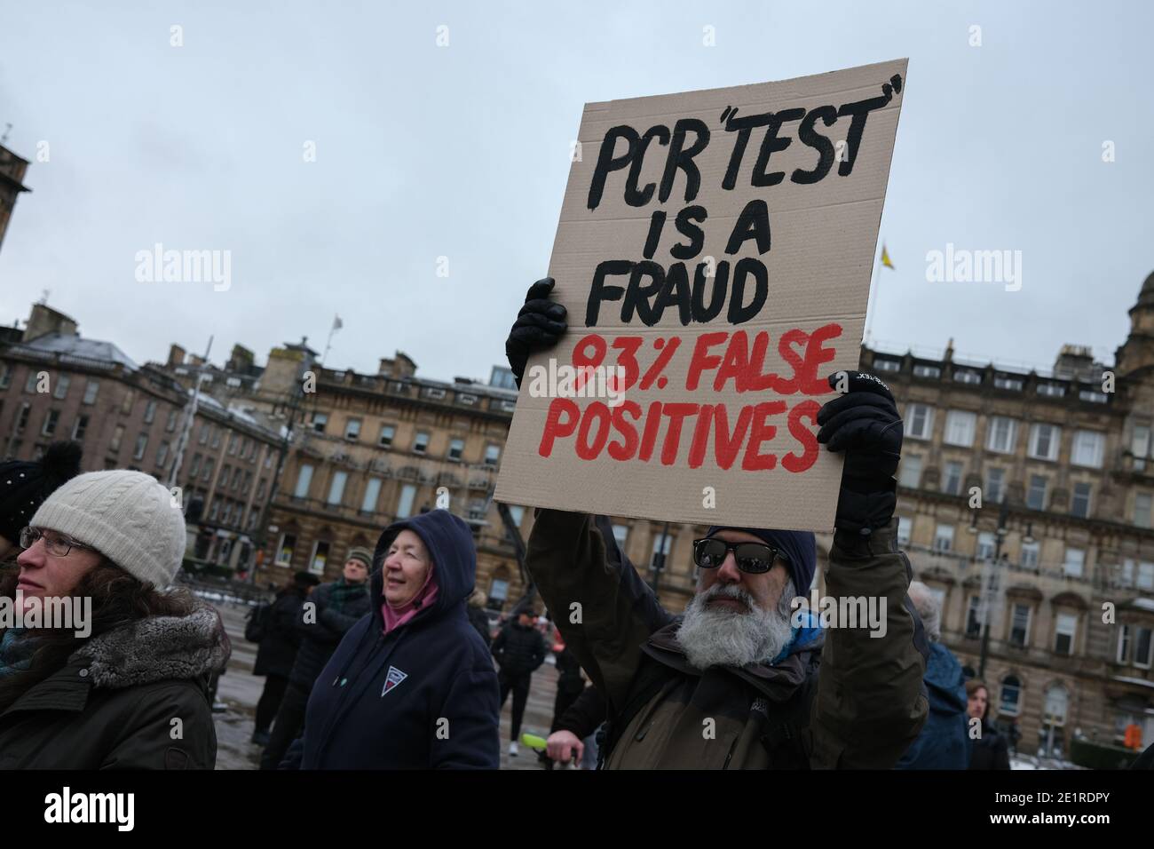Glasgow, UK, 9 January 2021. In the week when the UK saw record numbers of cases of Covid-19 being recorded, and daily record numbers of deaths, a small gathering of people protesting against lockdown, mask-wearing, social distancing and vaccinations, took place in George Square, in the city centre. Photo credit: Jeremy Sutton-Hibbert/Alamy Live News Stock Photo