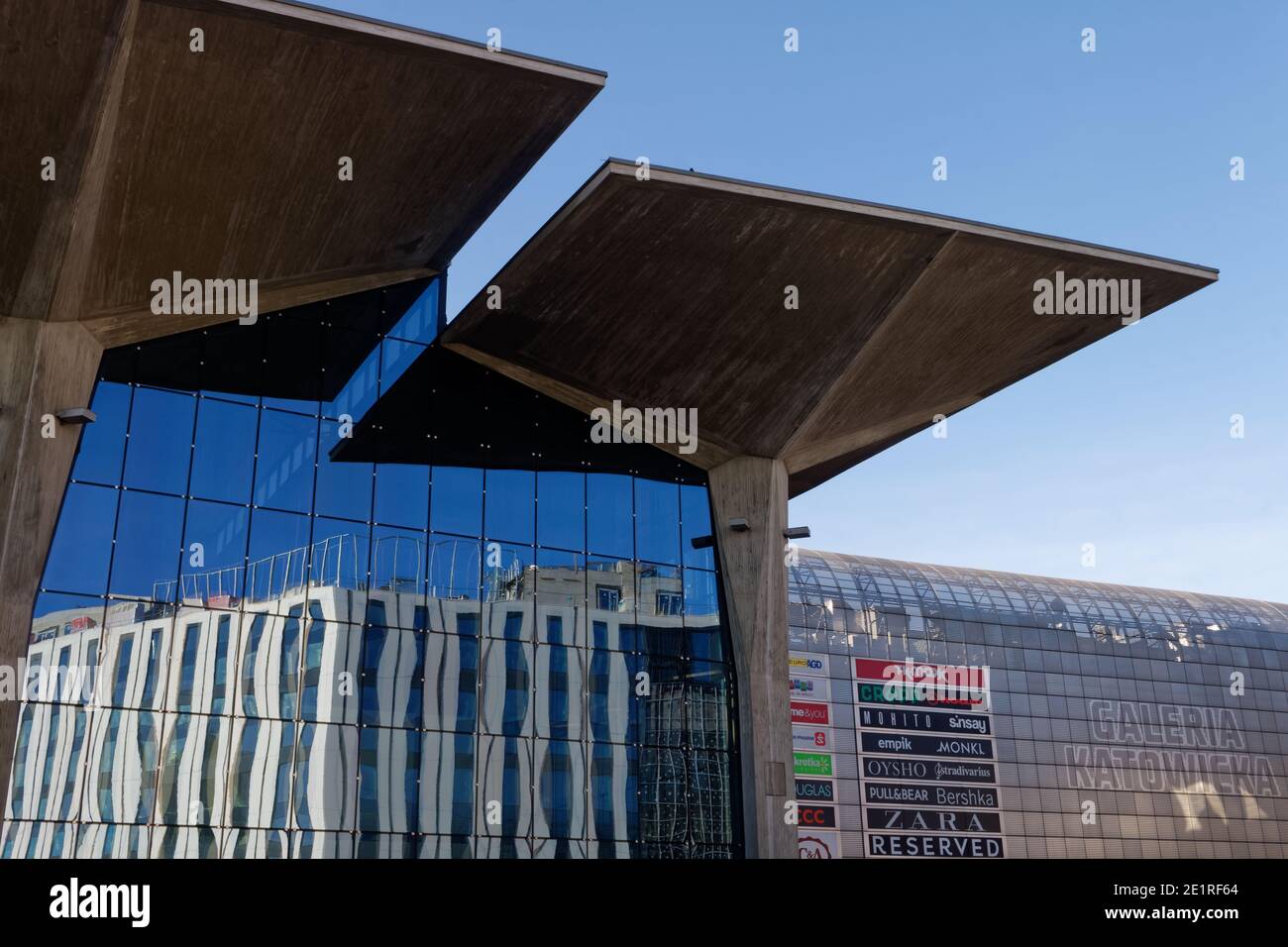 Brutalist railway station in Katowice with a new hotel reflected in glass  Stock Photo - Alamy