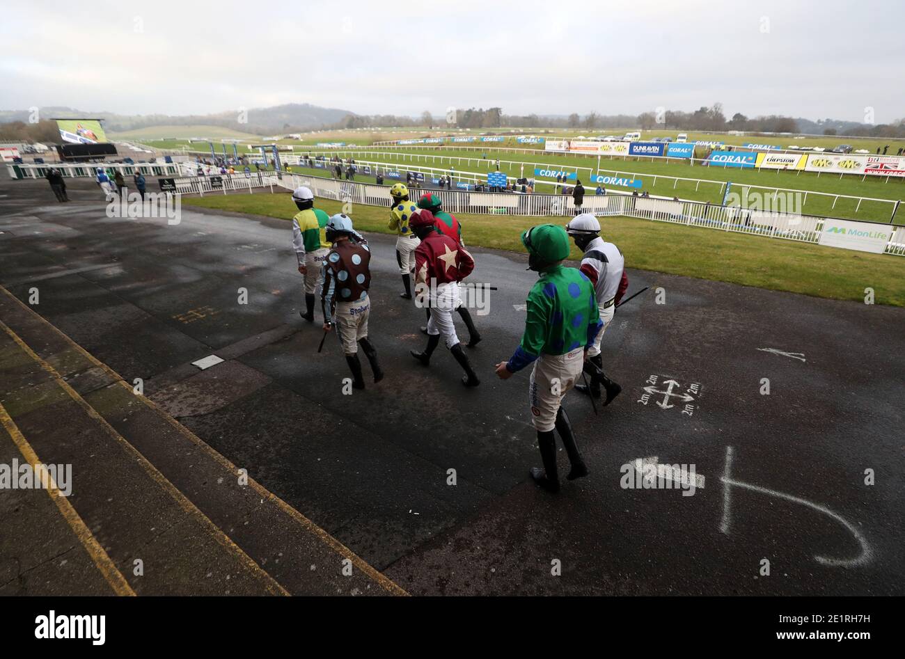 Jockeys make their way out for the Coral Welsh Grand National Handicap
