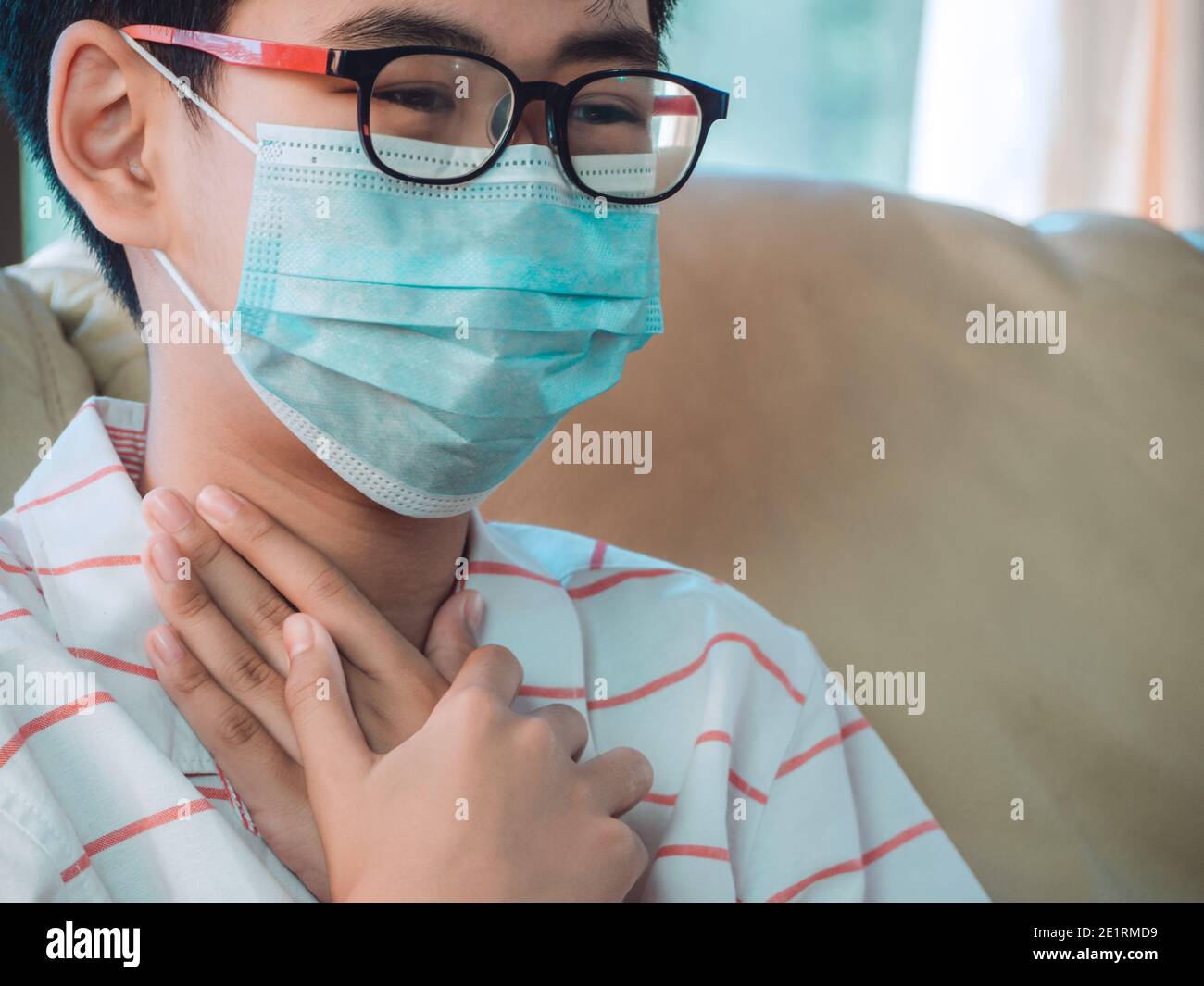 Little ill boy get sore throat or choking can't breath with unhappy and