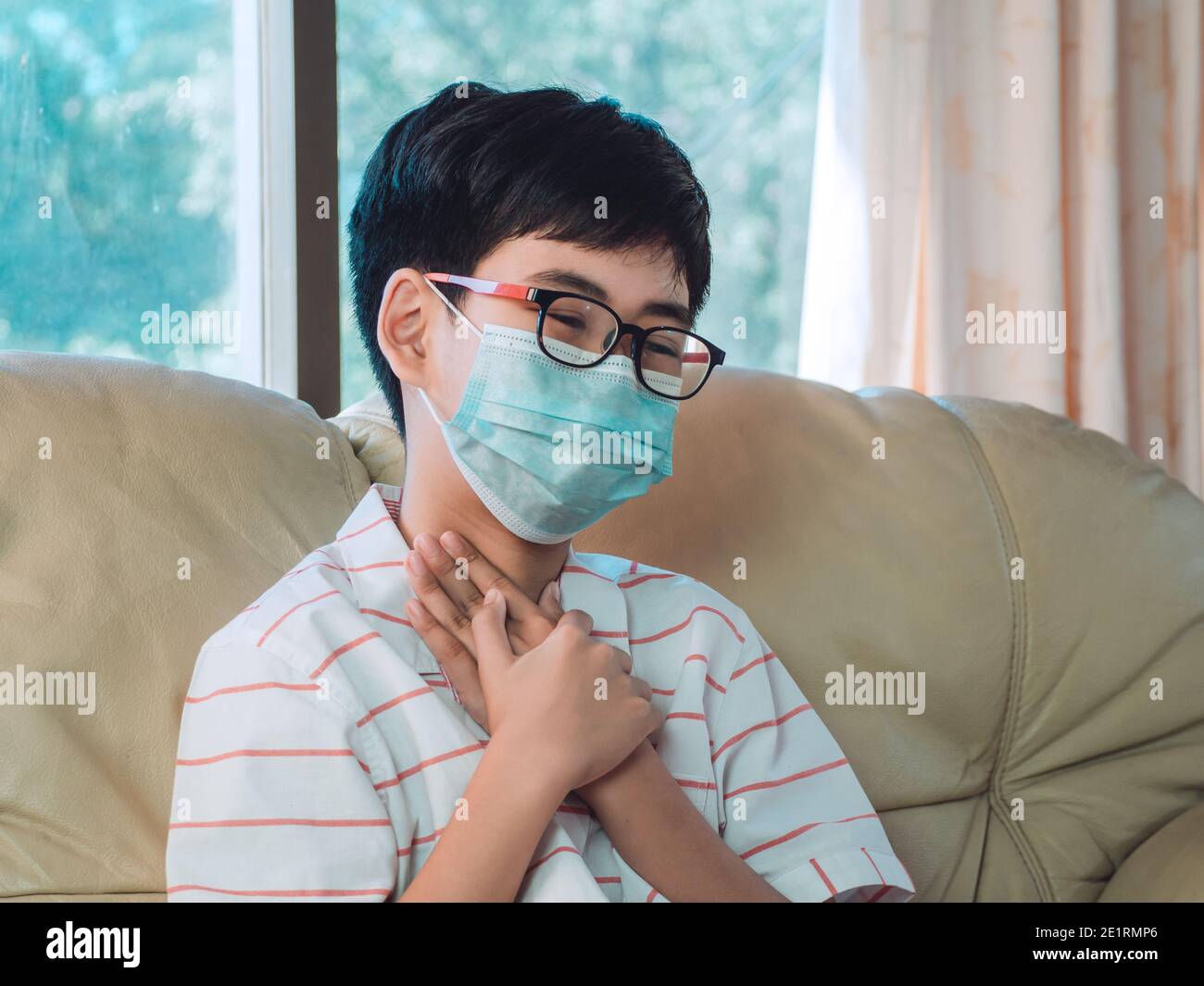 Little ill boy get sore throat or choking can't breath with unhappy and