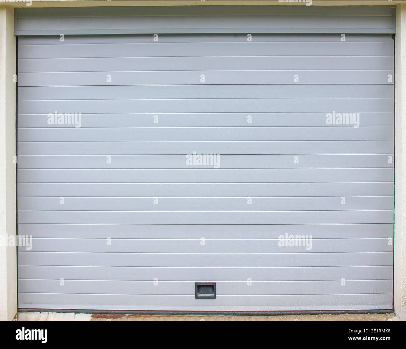 Plastic white garage door - exterior Stock Photo