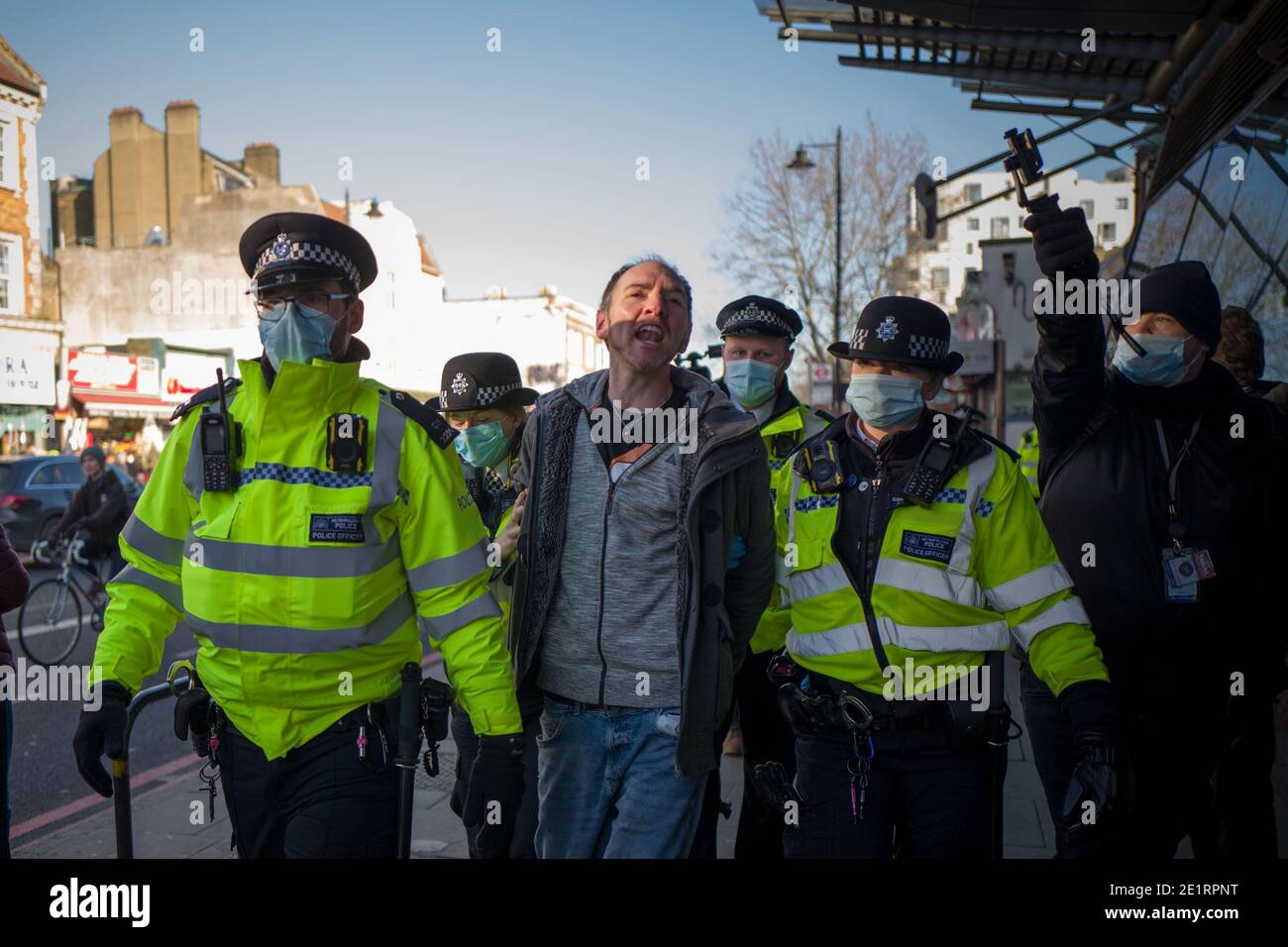 London, UK. 9th Jan, 2021. Man was arrested and taken to a police van in Clapham Common Credit: Velar Grant/ZUMA Wire/Alamy Live News Stock Photo