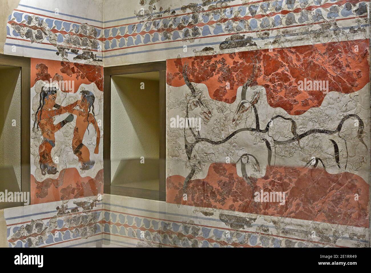 Frescos from the prehistoric town of Akrotiri, in Thera island (Santorini), 16th cent BC. At left, The Boxers, white at the right the Spring fresco. Stock Photo