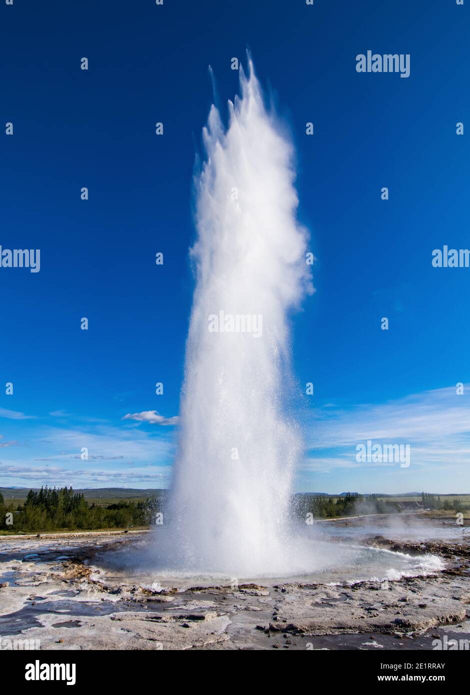 Eruption of the Strokkur geyser at the Haukadalur valley in Iceland Stock Photo