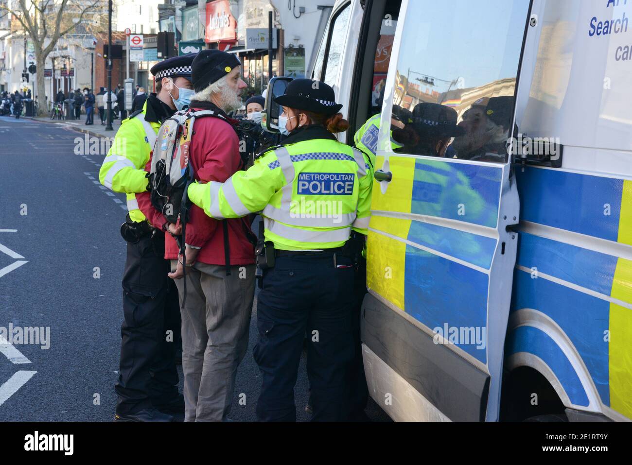 Anti lockdown protesters in Clapham Common. Few demonstrators arrested by Metropolitan Police for breaking the COVID-19 Lockdown regulations Stock Photo