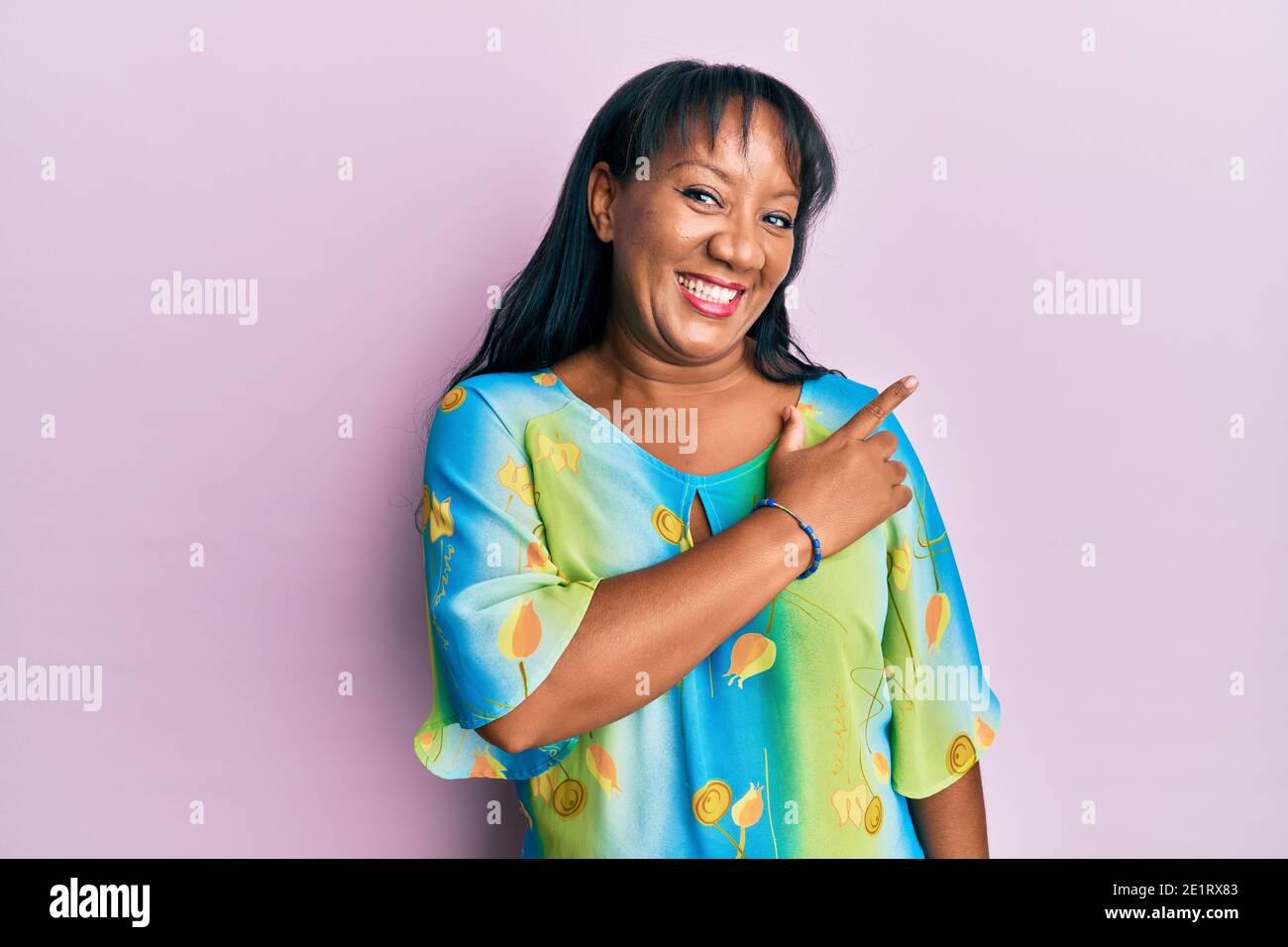 Middle age african american woman wearing casual clothes smiling ...