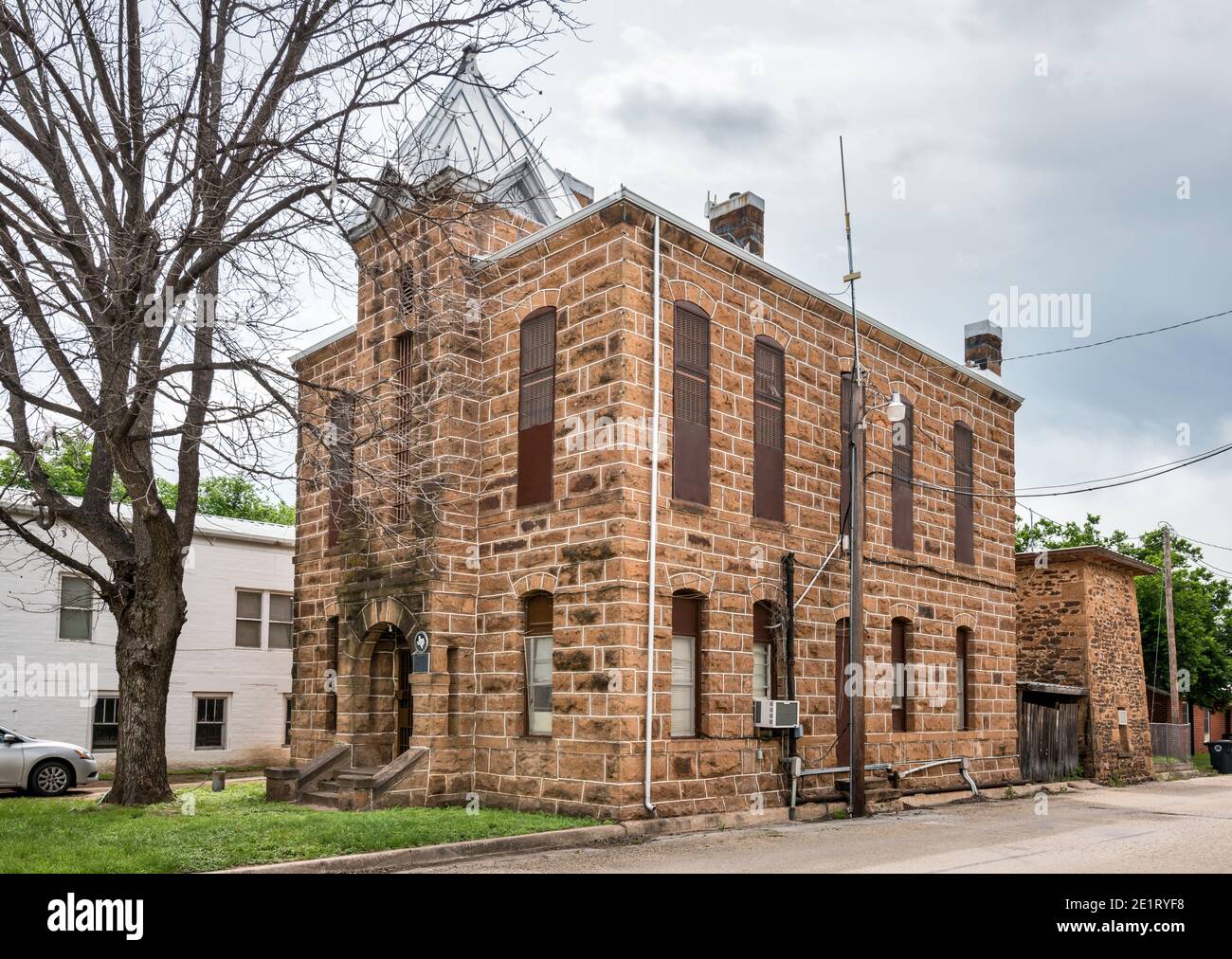 Mason County Jail, 1894, Romanesque Revival style, built from brown sandstone, in Mason, Edwards Plateau, Texas, USA Stock Photo