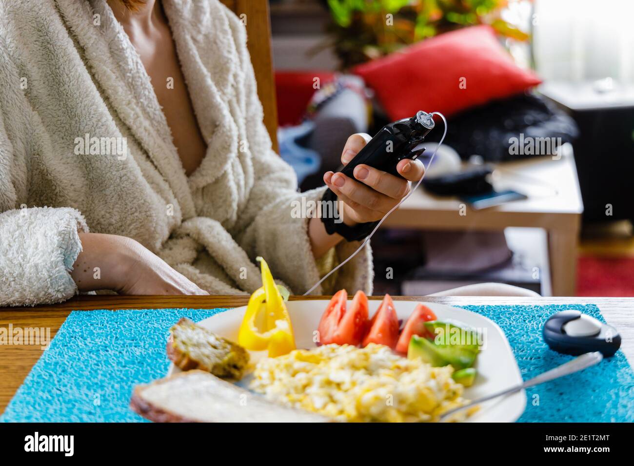 Modern diabetes treatment, woman checking glucose level and dosing