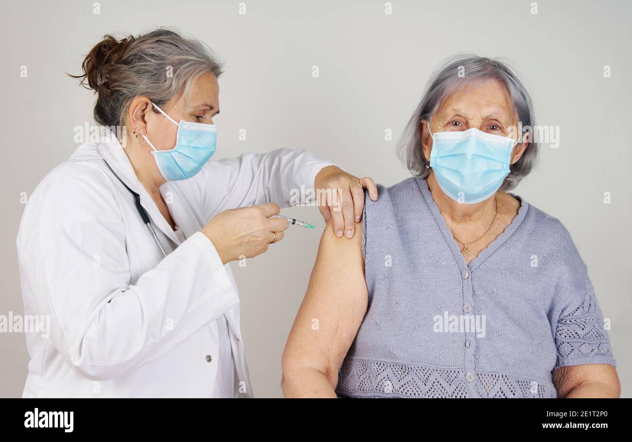 Senior woman vaccinated, COVID-19 concept Stock Photo