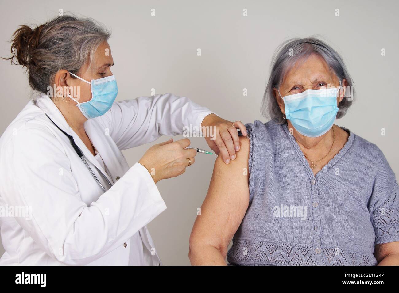 Healthcare worker vaccinated against coronavirus, COVID-19 concept Stock Photo