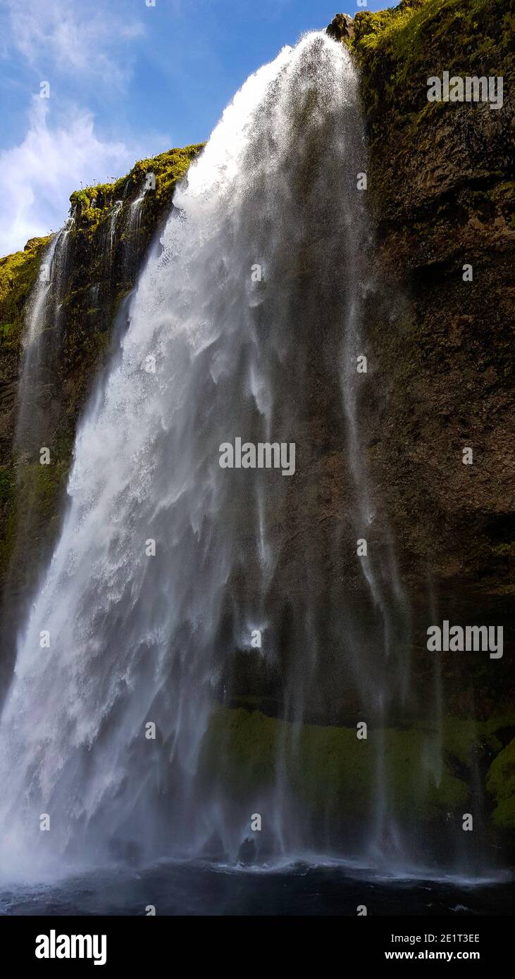 Landscape photography of waterfalls during a solo road trip across Iceland Stock Photo