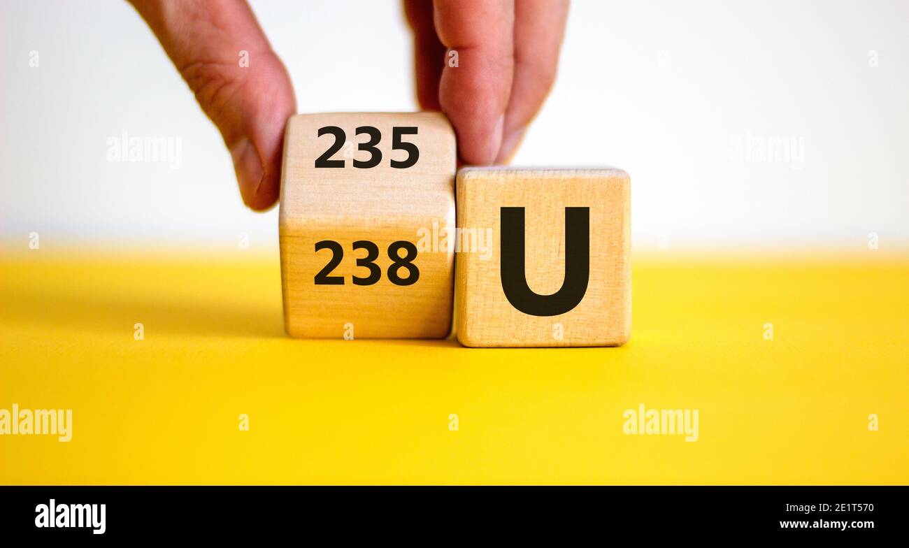 Uranium enrichment symbol. Hand turns the cube and changes the word