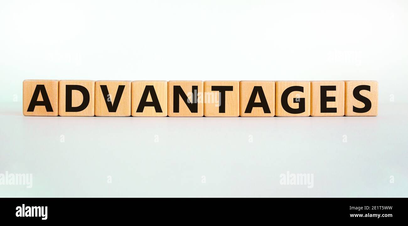 Advantages symbol. Concept word 'advantages' on wooden cubes on a beautiful white background. Business and advantages concept, copy space. Stock Photo