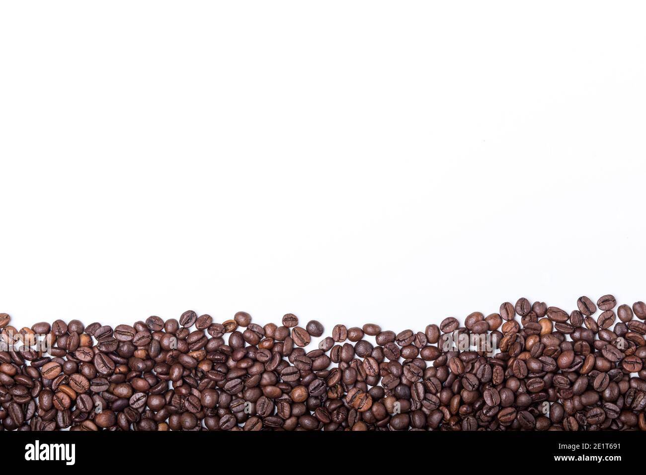 coffee beans isolated on white background with space left for copy text ...