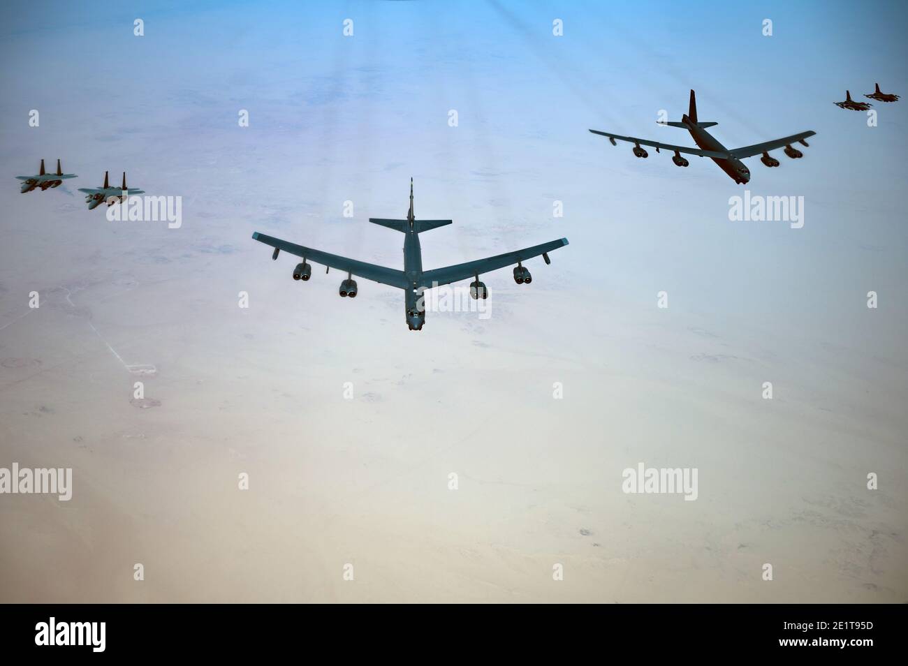 Saudi Arabia, Saudi Arabia. 07th Jan, 2021. U.S. Air Force B-52 Stratofortress strategic bomber aircraft are escorted by Royal Saudi Arabian Air Force F-15S/A fighters, left, and U.S. Air Force F-16 Fighting Falcons as they fly over Saudi airspace January 7, 2021 in Saudi Arabia. The bomber and escort is a show of force mission as a message to Iran. Credit: Planetpix/Alamy Live News Stock Photo