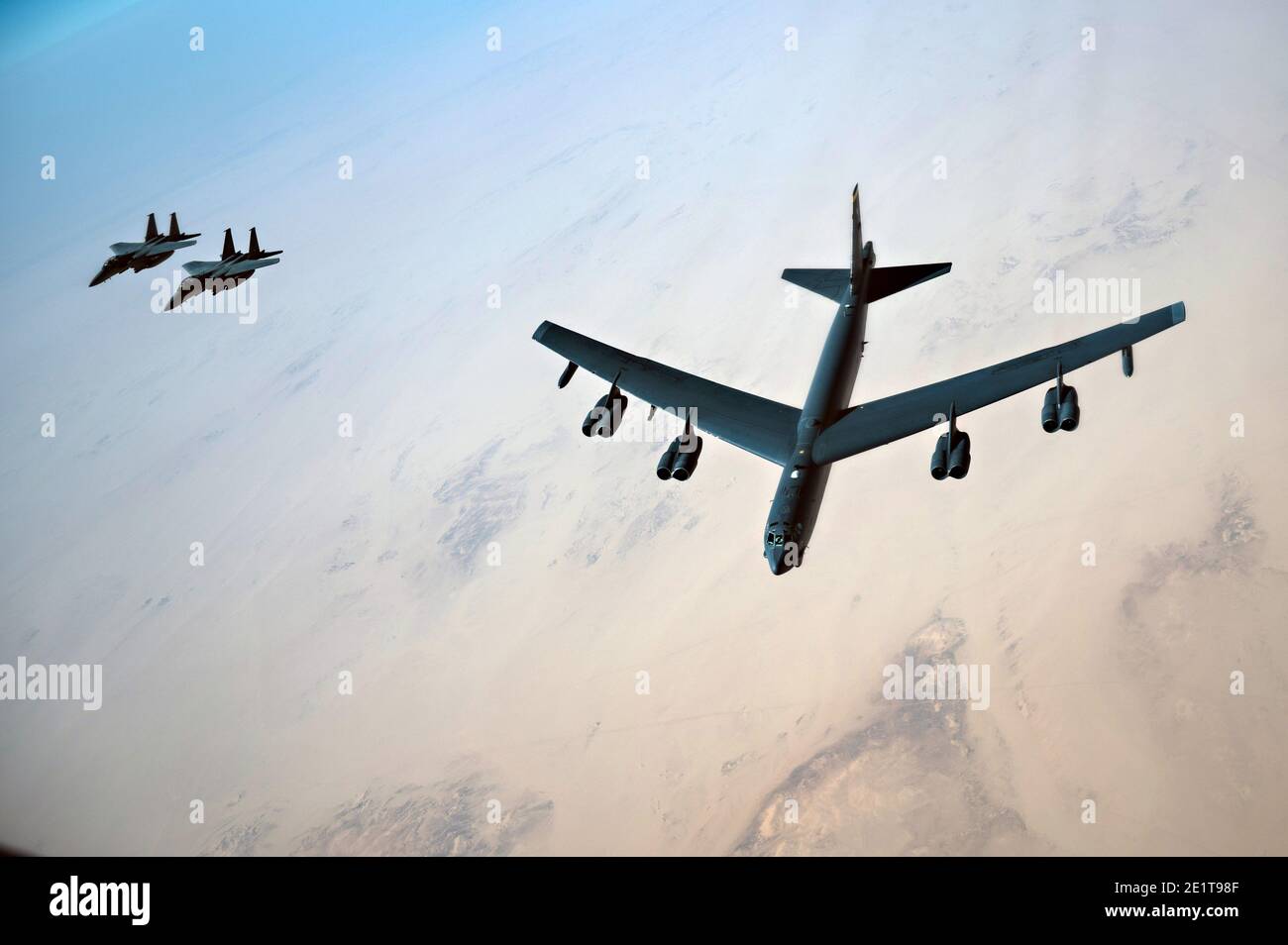 Saudi Arabia, Saudi Arabia. 07th Jan, 2021. A U.S. Air Force B-52 Stratofortress strategic bomber aircraft is escorted by Royal Saudi Arabian Air Force F-15S/A fighter aircraft as they fly over Saudi airspace January 7, 2021 in Saudi Arabia. The bomber and escort is a show of force mission as a message to Iran. Credit: Planetpix/Alamy Live News Stock Photo