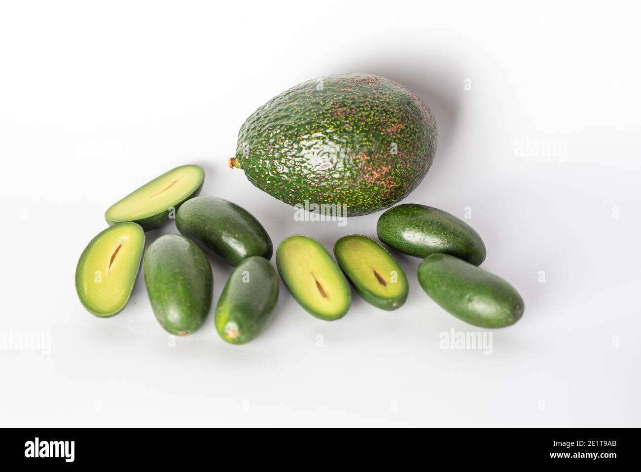 Cocktail avocados - stoneless snack avocados with a smooth creamy texture and edible skin. Stock Photo