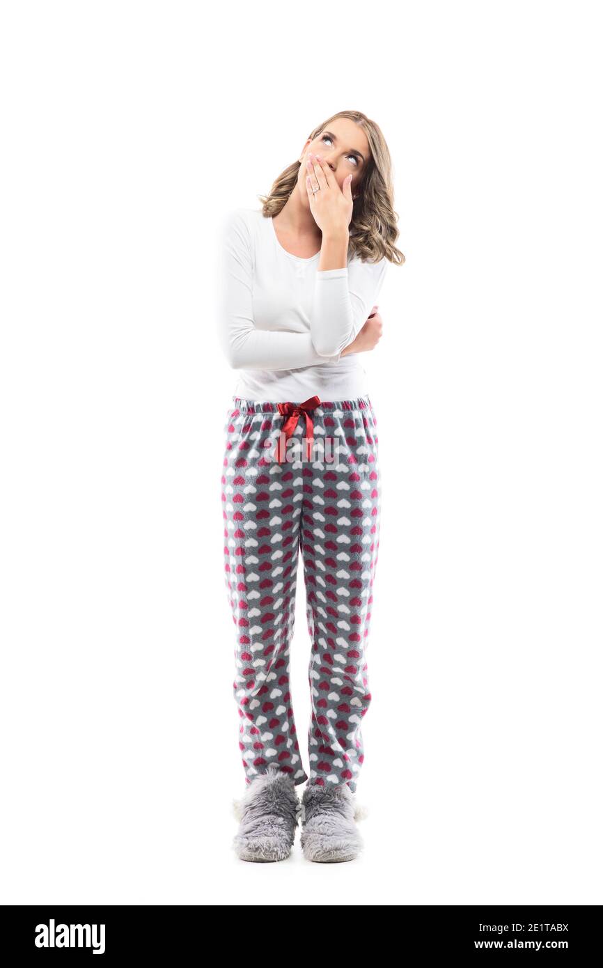 Tired Pyjamas Sleepy tired beautiful girl in comfy pajamas and fluffy slippers ...