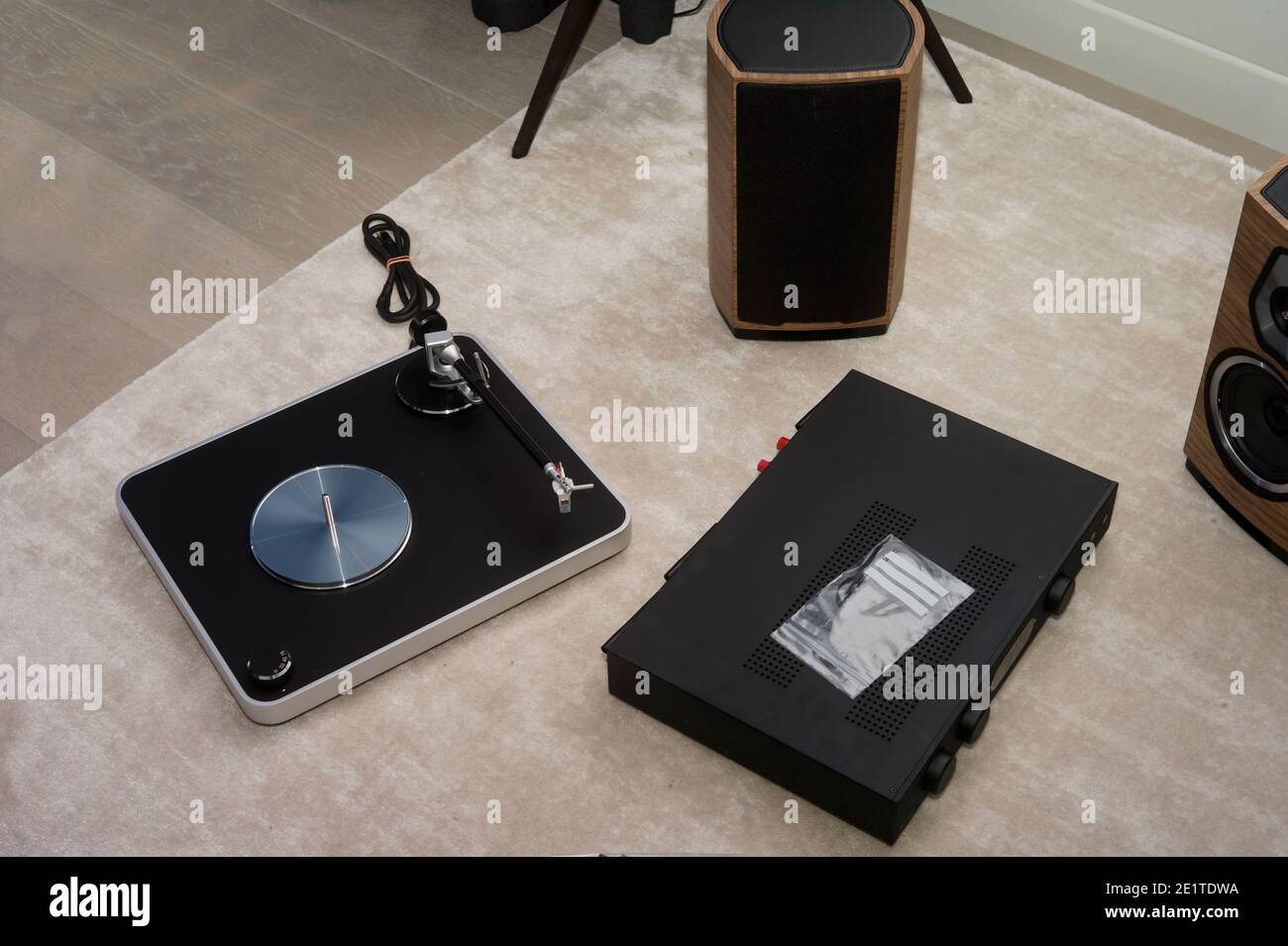 brand new turntable and components of stereo music system placed on the