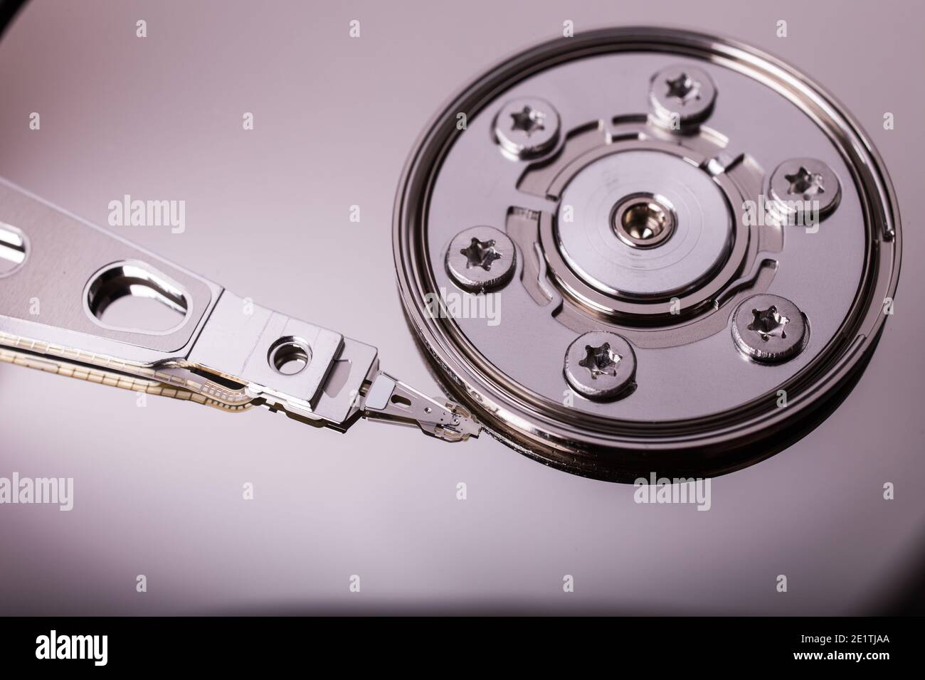 Macro view of spindle of the open hard disk drive, HDD, detail Stock Photo