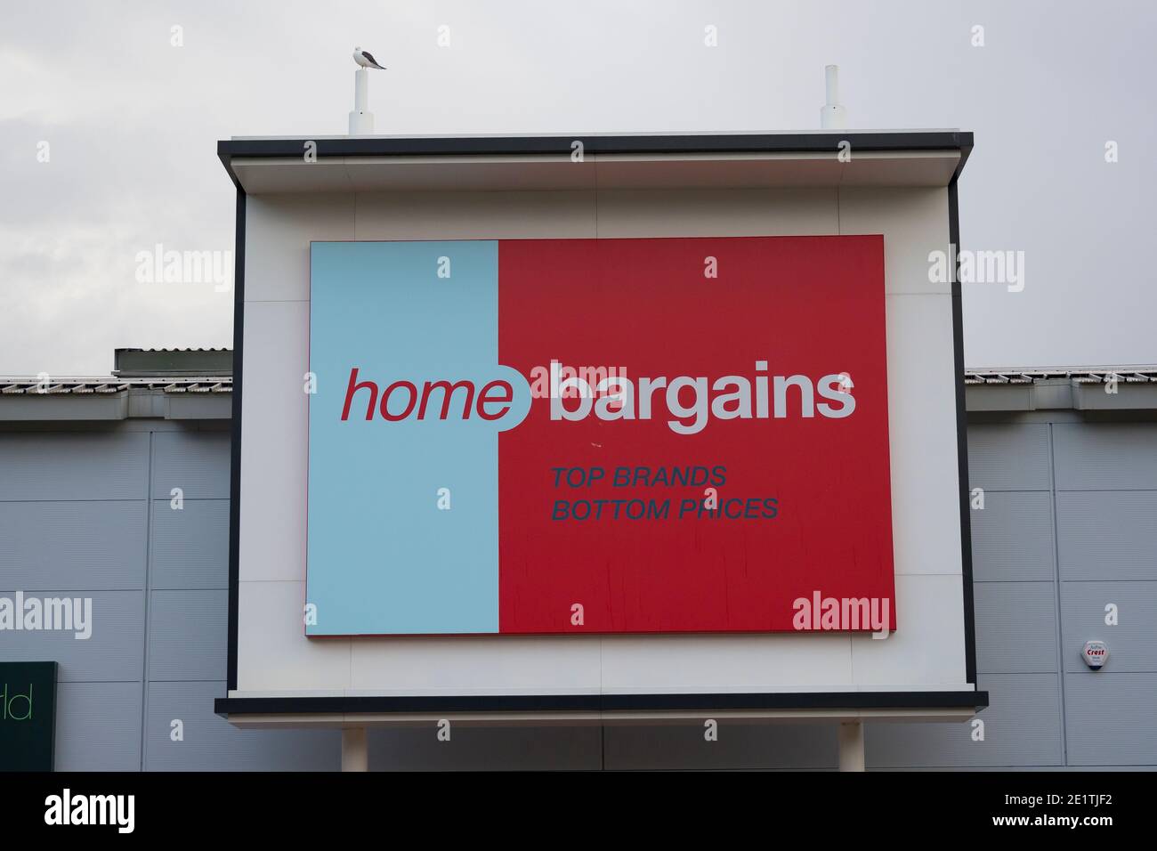 A close-up of a Home Bargains store sign in Cardiff, Wales, United Kingdom. Stock Photo