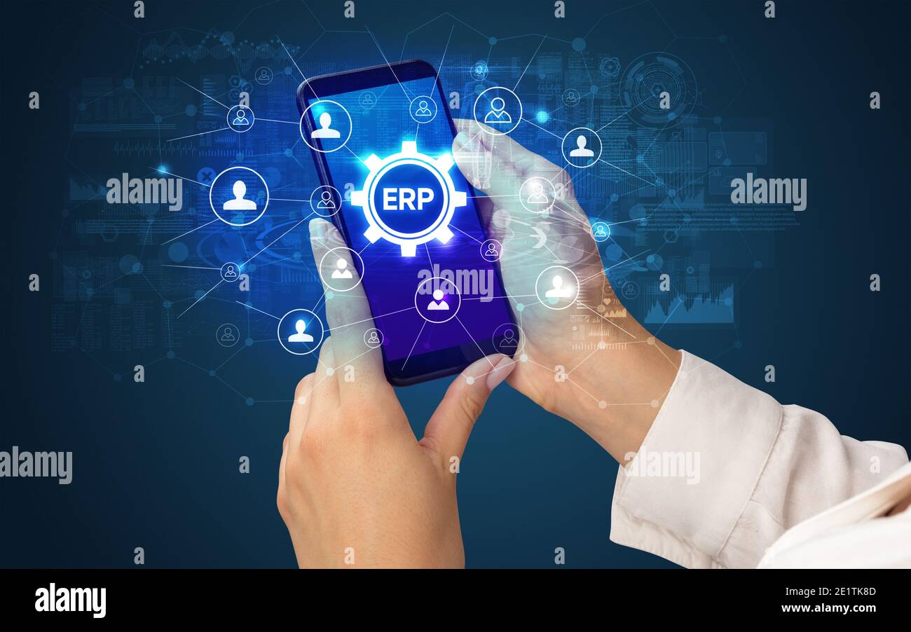Female hand holding smartphone with ERP abbreviation, modern technology concept Stock Photo