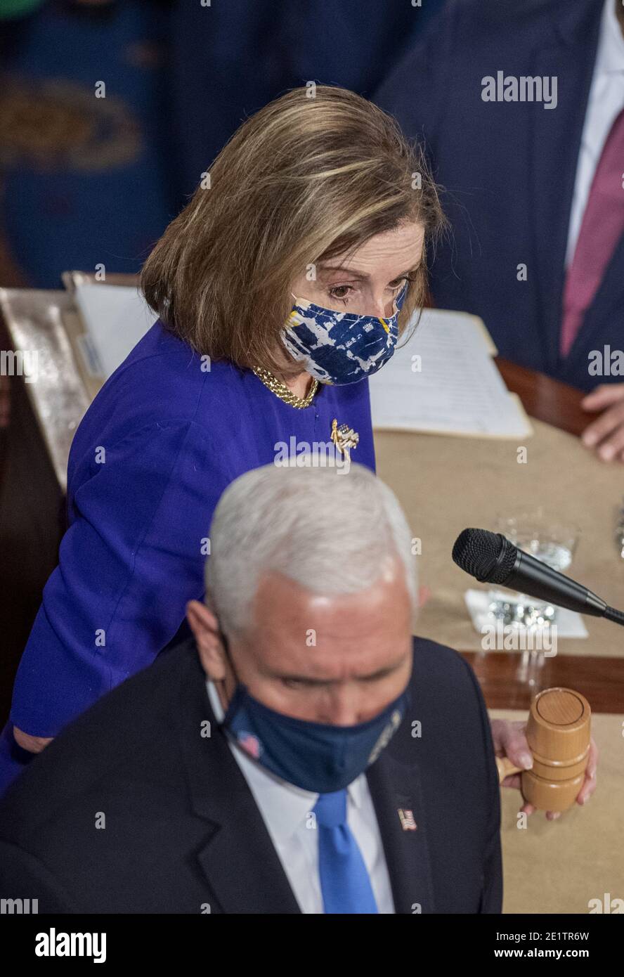 Washington, United States. 09th Jan, 2021. House Speaker Nancy Pelosi and Vice President Mike Pence oversee a joint session of Congress the U.S. Capitol in Washington, DC on Wednesday, January 6, 2021. A pro-Trump mob broke into the U.S. Capitol causing destruction, an evacuation and at least four deaths. After a long delay Congress certified Joe Biden's victory in the Presidential election. Photo by Pat Benic/UPI Credit: UPI/Alamy Live News Stock Photo