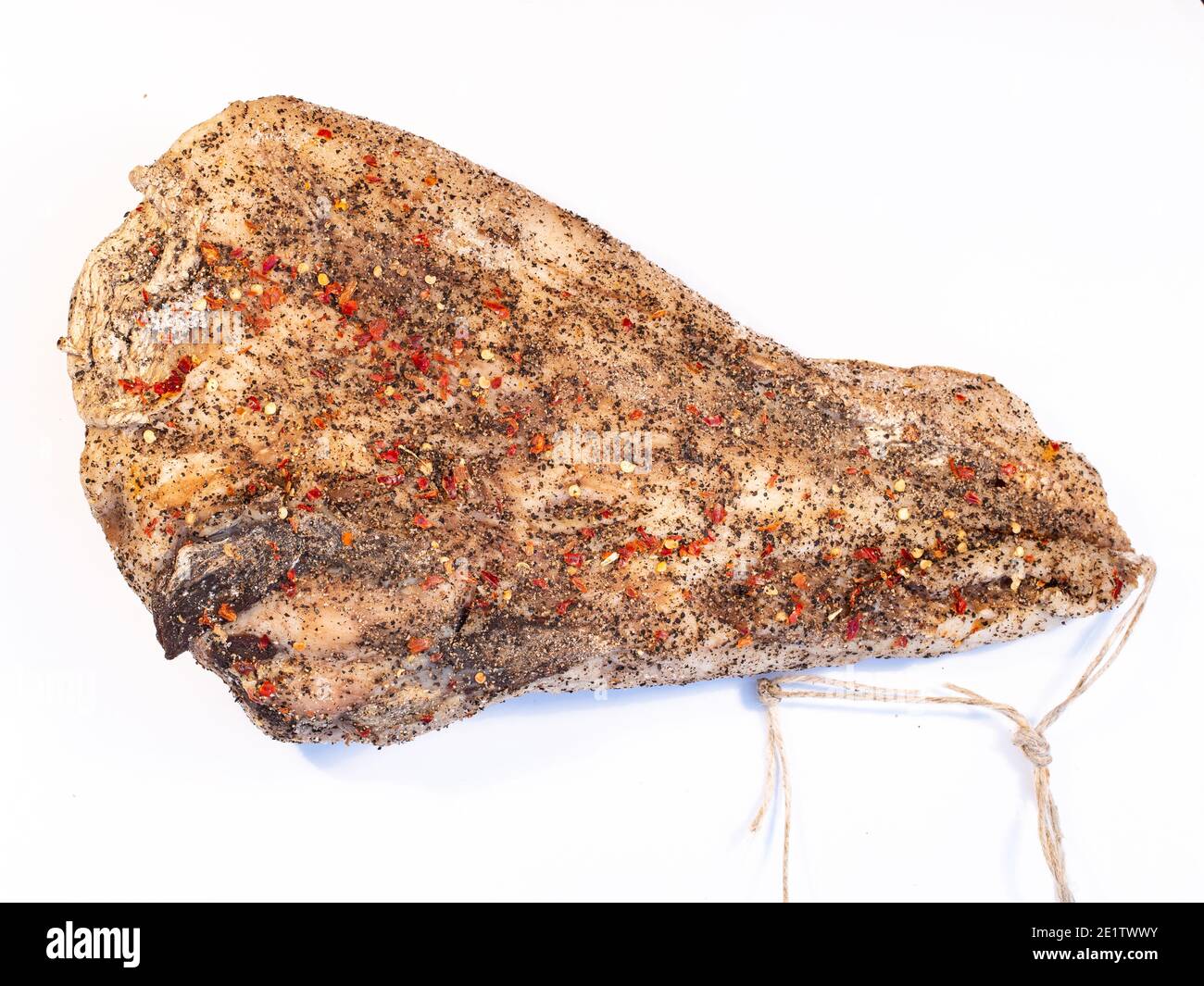 italian guanciale pork cheek on a white background main ingredient for