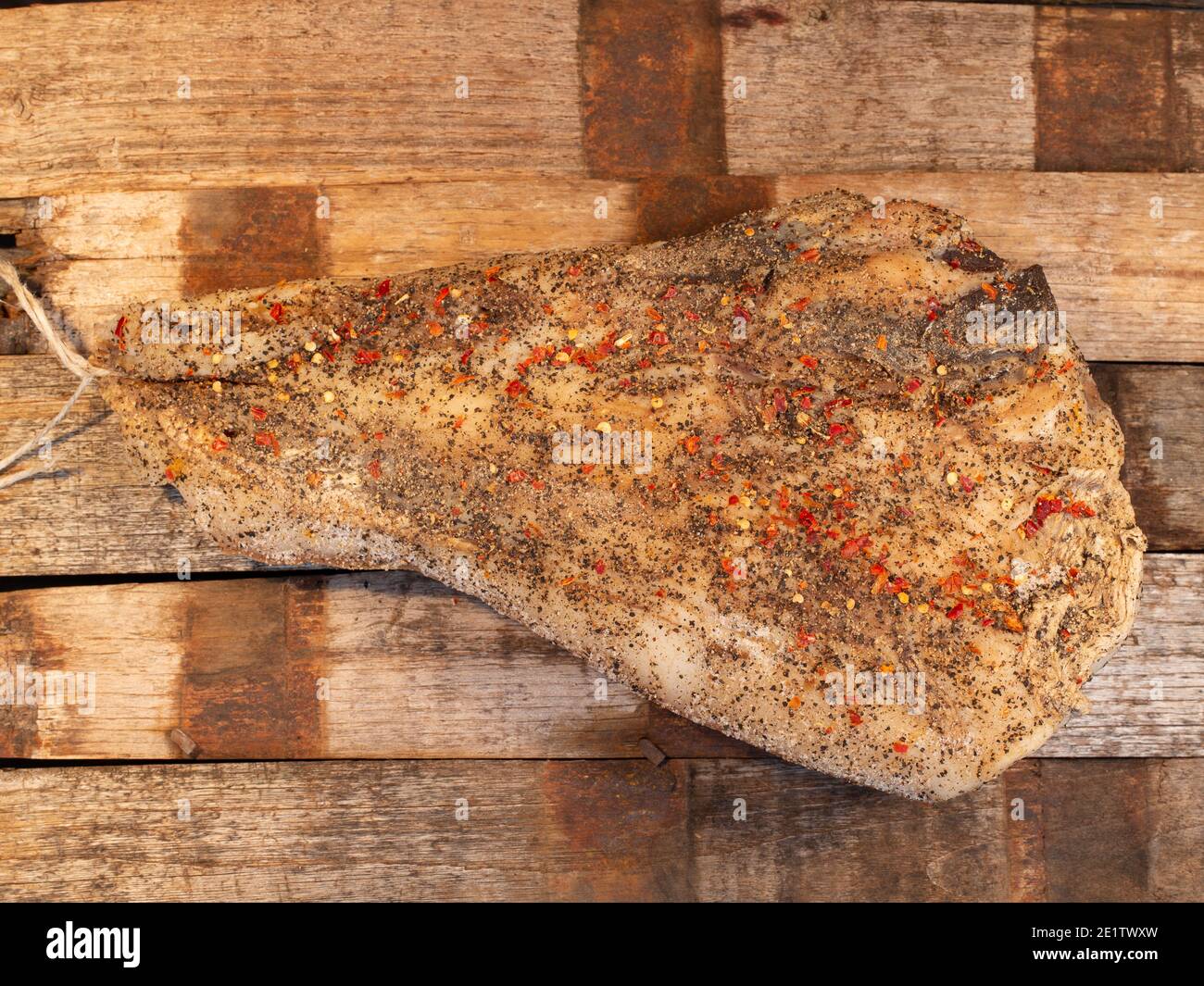 italian guanciale pork cheek on a wooden board. main ingredient for carbonara and matriciana Stock Photo