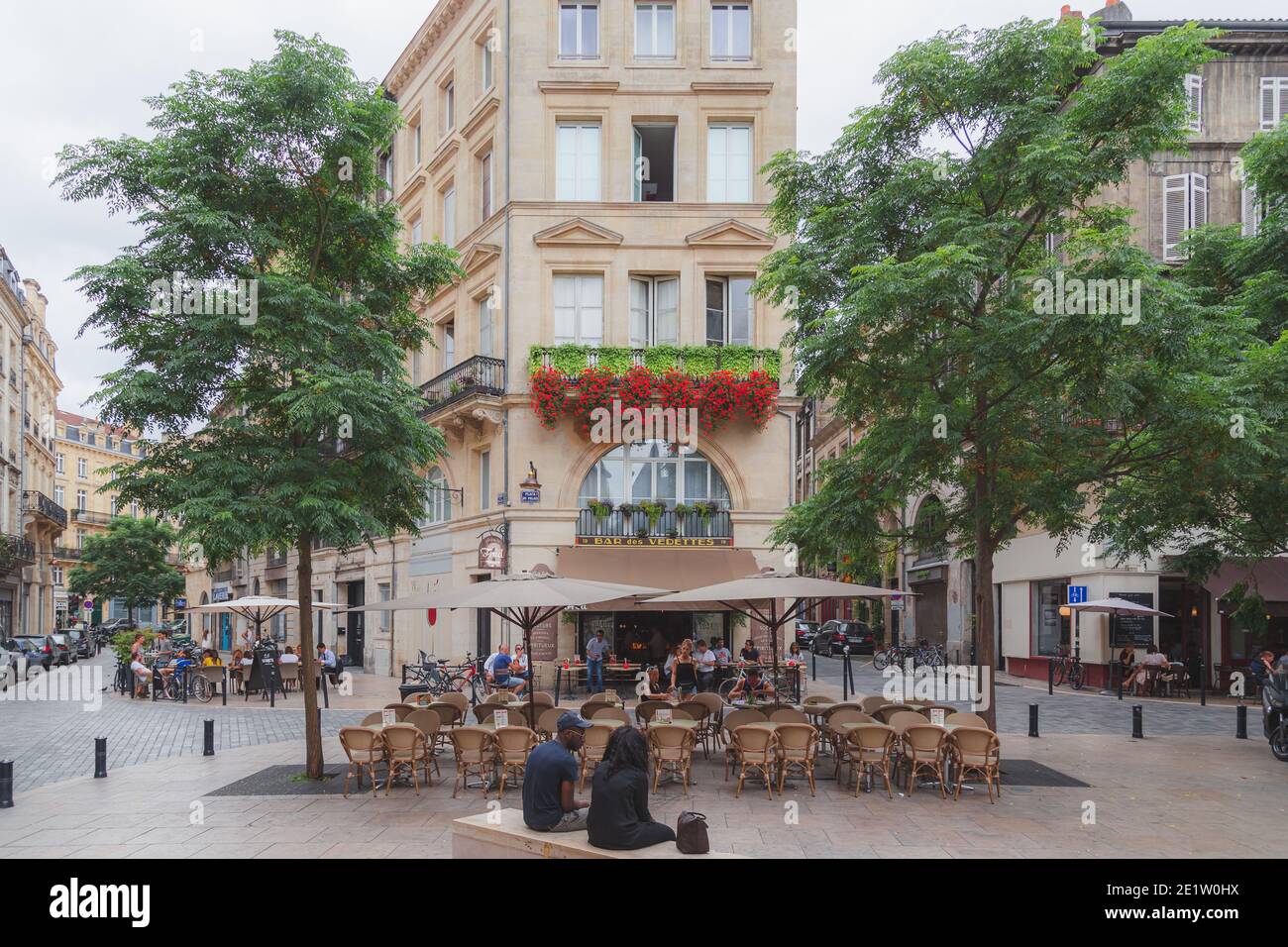 Bordeaux, France - July 22 2016: Outdoor summer scene at Place du Palais, a popular spot with tourists and locals to enjoy cafes in Bordeaux, France Stock Photo