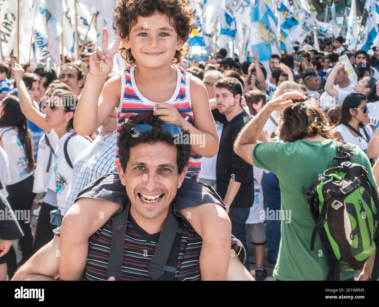 Man and boy at political rally Buenos Aires, Argentina Stock Photo
