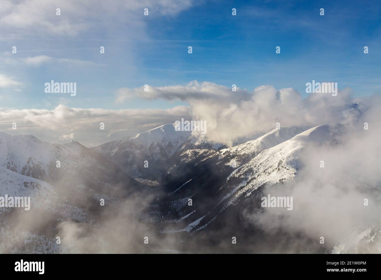 Low clouds over Tatry mountains during winter, Poland Stock Photo - Alamy