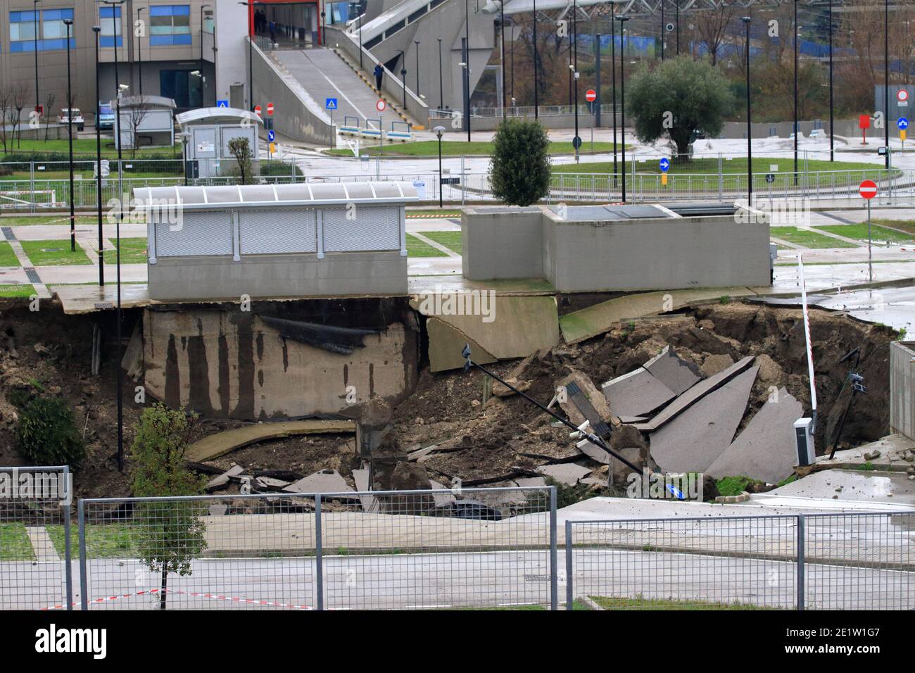 Naples, Italy. 08th Jan, 2021. On the morning of the day 08 January a loud roar was felt at the Sea Hospital of Naples, Ponticelli area. To give in, certainly causes infiltration of water, was a part of the parking lot of the Hospital. Swallow three cars early in the morning at that point.A chasm, according to the fire department, about two thousand square meters wide and twenty meters deep.The entire parking lot has been subjected to criminal seizure by the judicial authority, for the investigation of the houses of the disaster. Credit: Pacific Press Media Production Corp./Alamy Live News Stock Photo