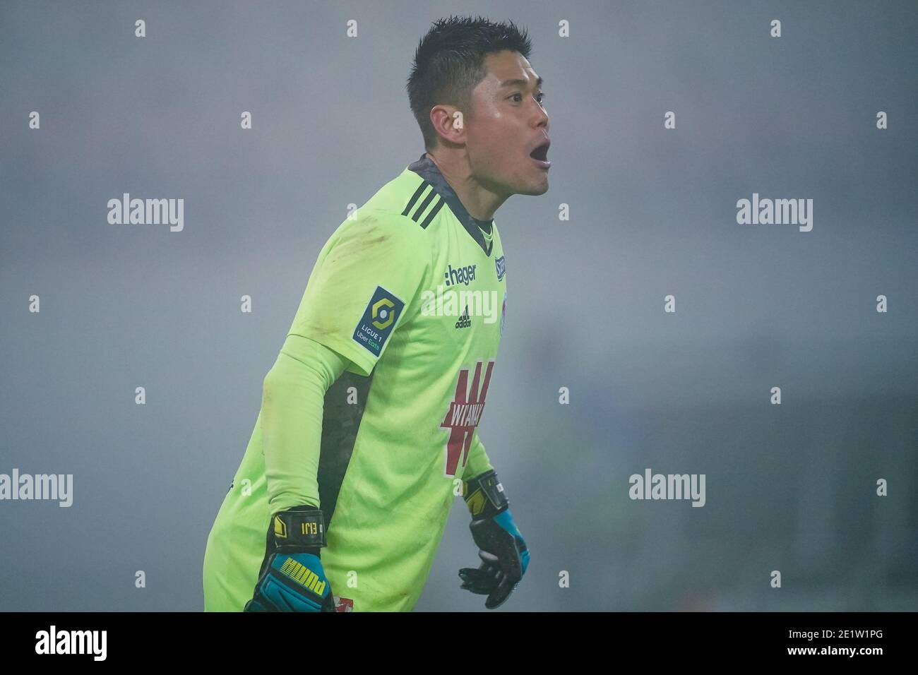 LENS, NETHERLANDS - JANUARY 9: L-R: Eiji Kawashima of RC Strasbourg during the Ligue 1 match between RC Lens and RC Strasbourg at Stade Bollaert-Delel Stock Photo