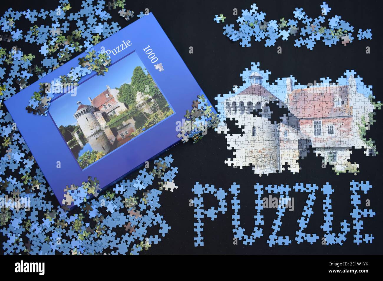 1000 pieces jigsaw featuring English castle Puzzle is game testing attention to detail The solver has to fit separate parts together forming a picture Stock Photo