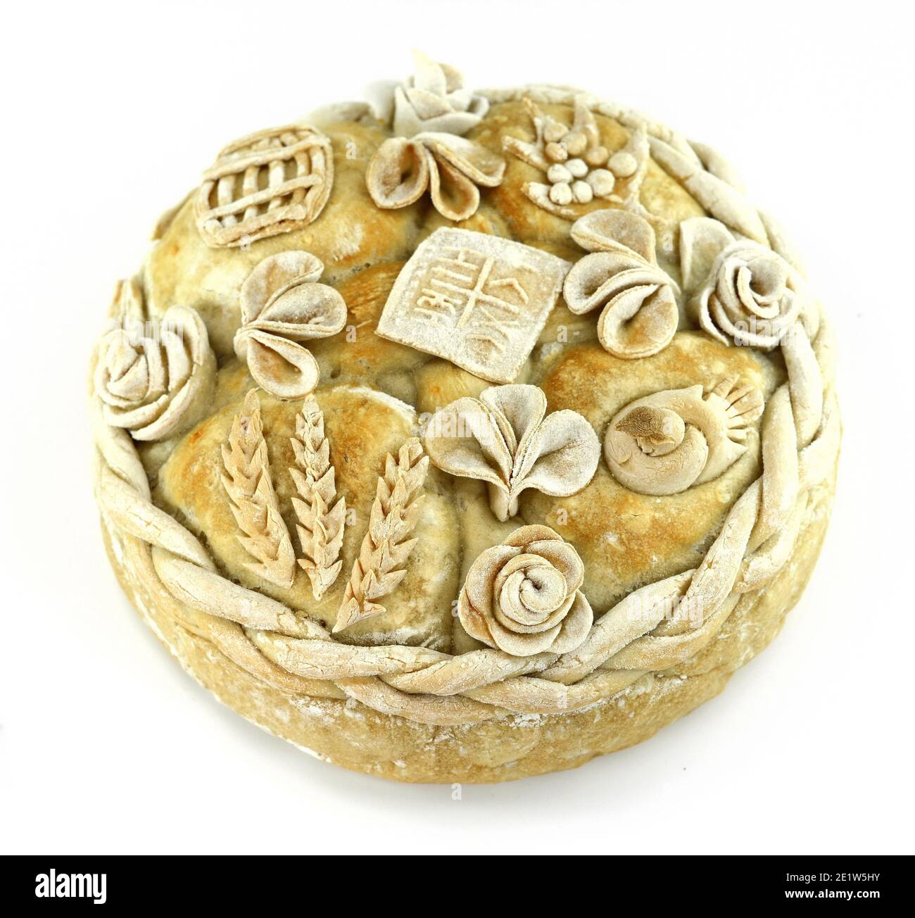 Homemade decorated Serbian slava bread isolated on white background