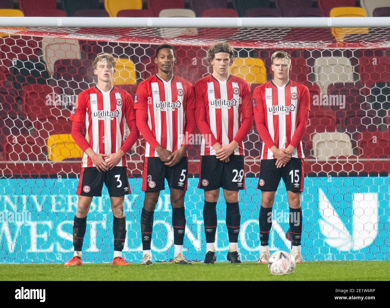 Brentford, UK. 09th Jan, 2021. Brentford wall from L to R: Mads Roerslev Rasmussen; Ethan Pinnock; Mads Bech Sorensen and Brentford Marcus Forss during the FA Cup 3rd round behind closed doors match between Brentford and Middlesbrough at the Brentford Community Stadium, Brentford, England on 9 January 2021. Photo by Andrew Aleksiejczuk/PRiME Media Images. Credit: PRiME Media Images/Alamy Live News Stock Photo