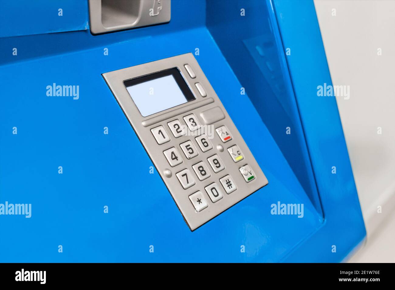 Keypad with a screen for dialing numbers and symbols pin-code terminal for issuing money, close-up. Stock Photo