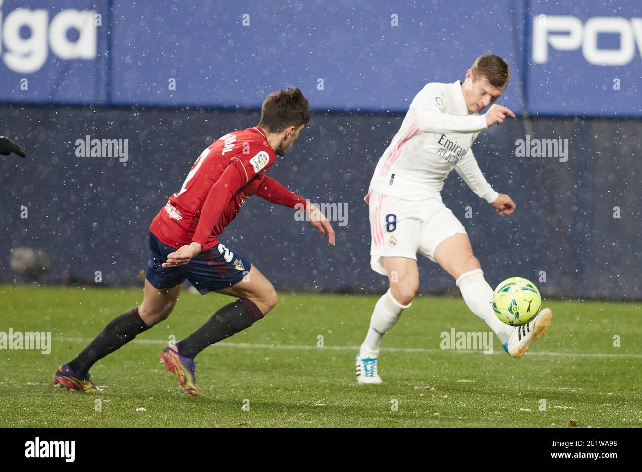 Toni Kroos (midfield; Real Madrid) and Nacho Vidal (defender; CA Osasuna) are seen in action during the Spanish football of La Liga Santander, match between CA Osasuna and Real Madrid at the Sadar stadium in Pamplona.(Final score; CA Osasuna 0:0 Real Madrid) Stock Photo