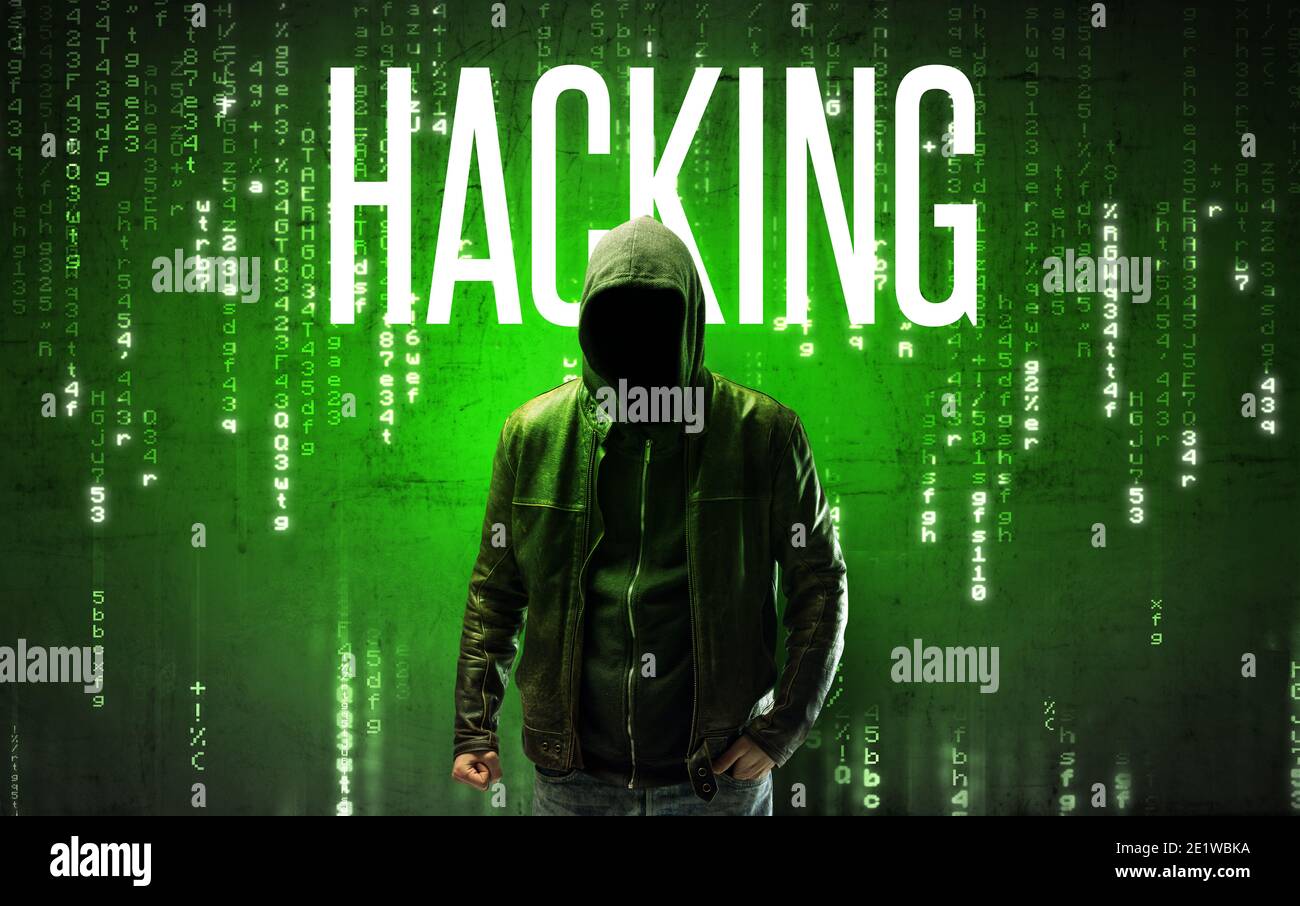 Faceless hacker with HACKING inscription, hacking concept Stock Photo
