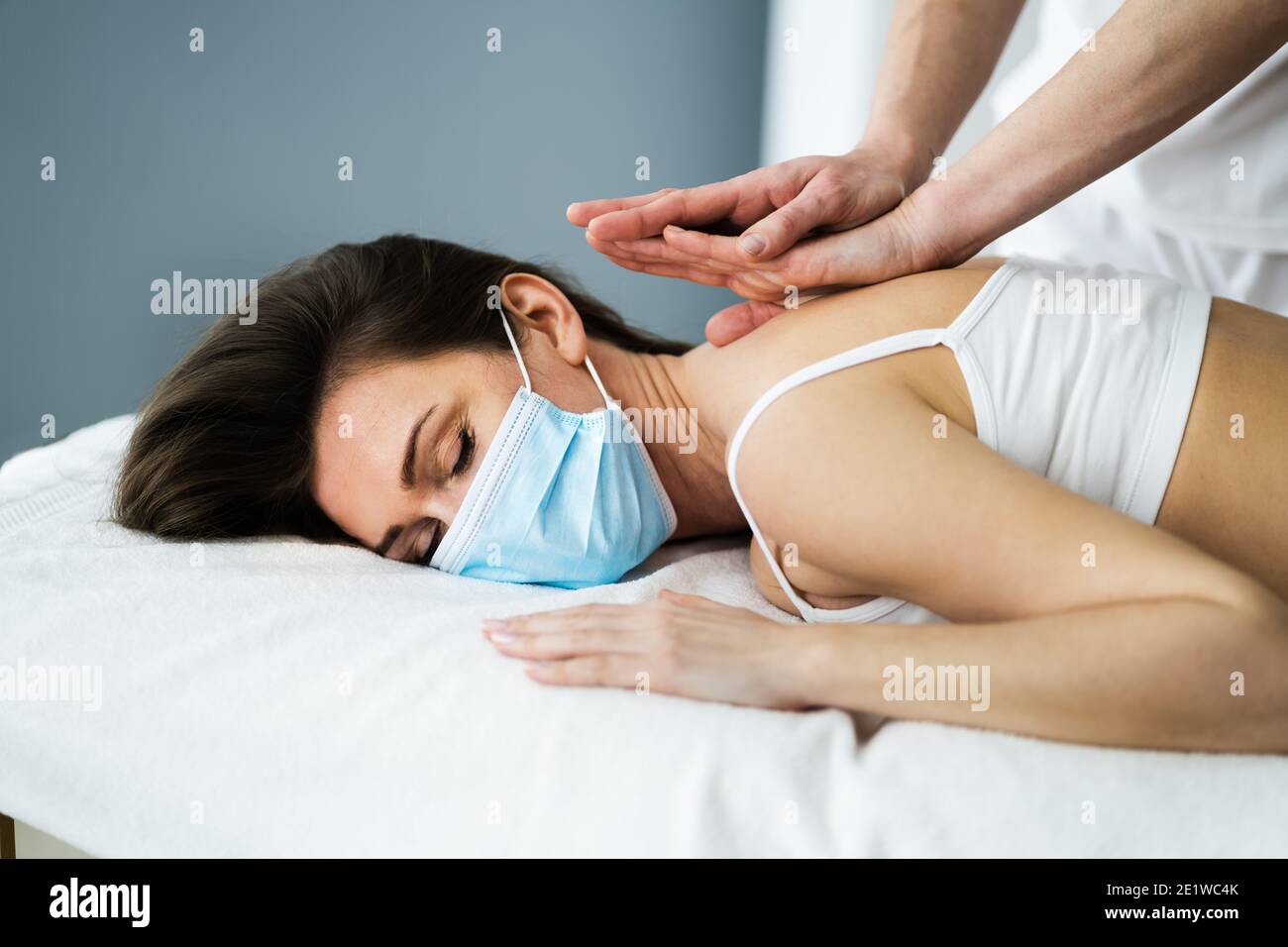 Chiropractic Reflexology Spa Therapy Massage In Face Mask Stock Photo