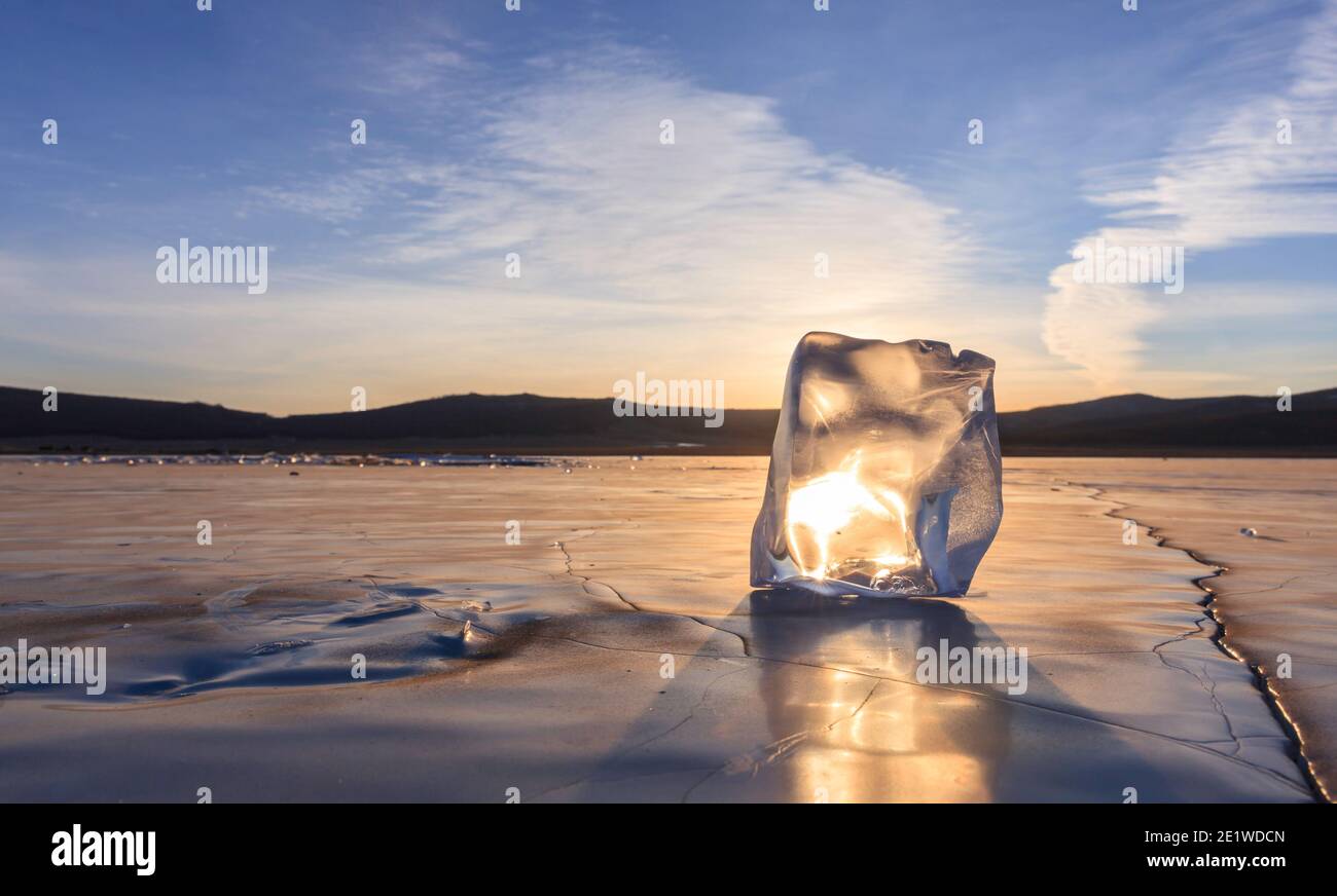 Sunrise on icy Lake khogsvol in Mongolia Stock Photo
