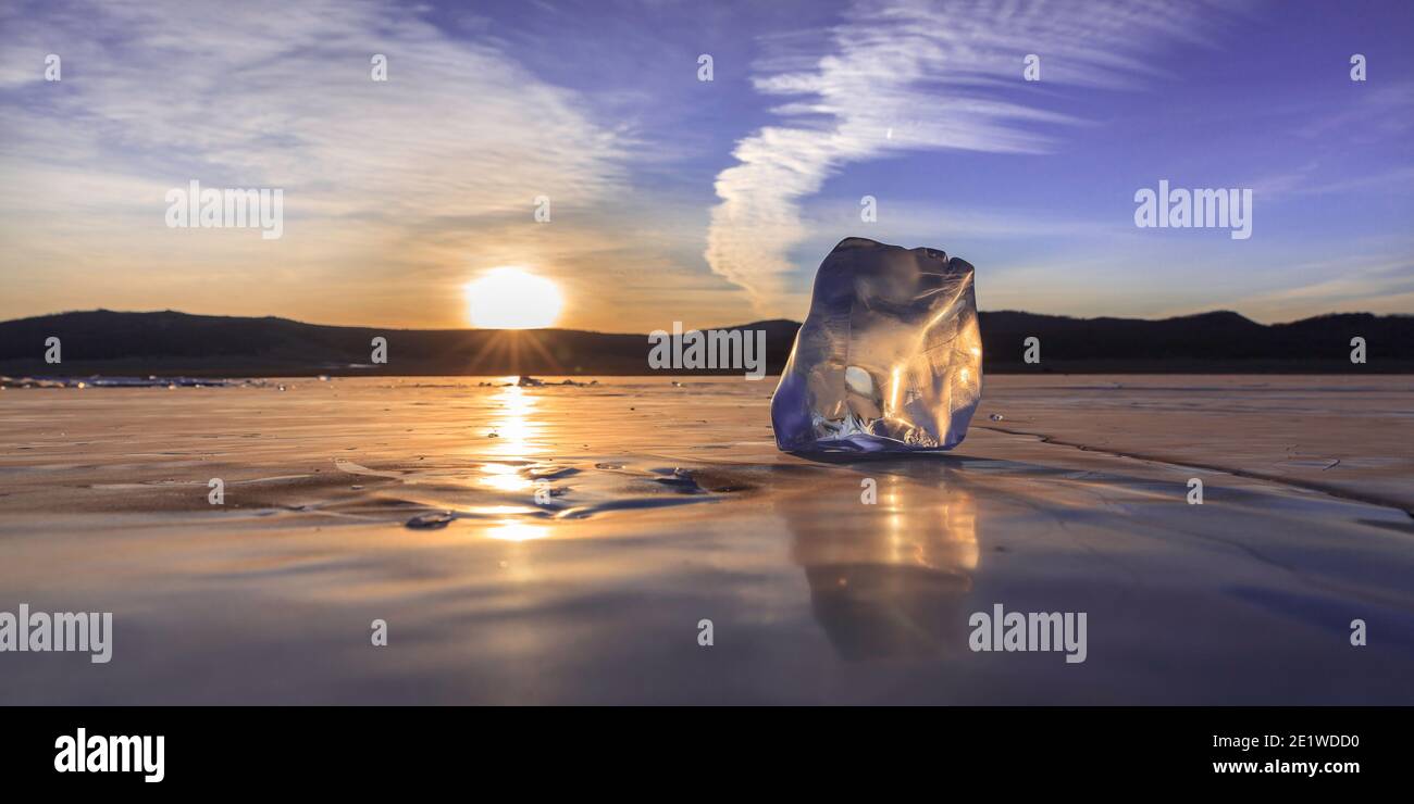 Sunrise on icy Lake khogsvol in Mongolia Stock Photo